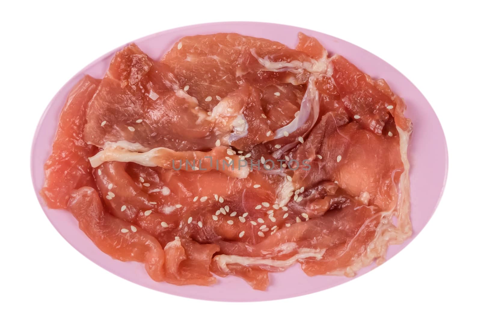 top view raw pork with white sesame on plate  isolated on white background