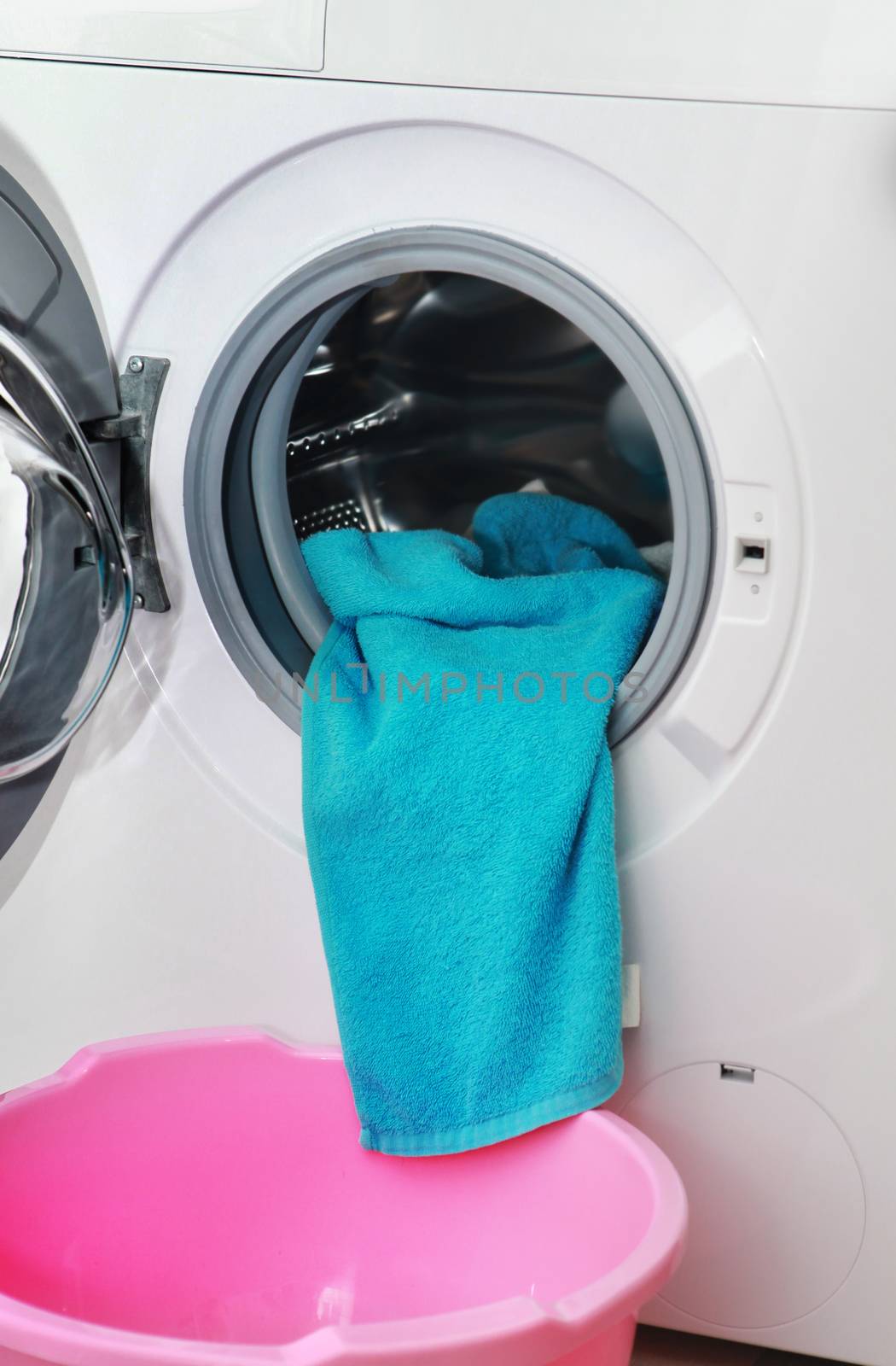 blue terry towel in the washing machine