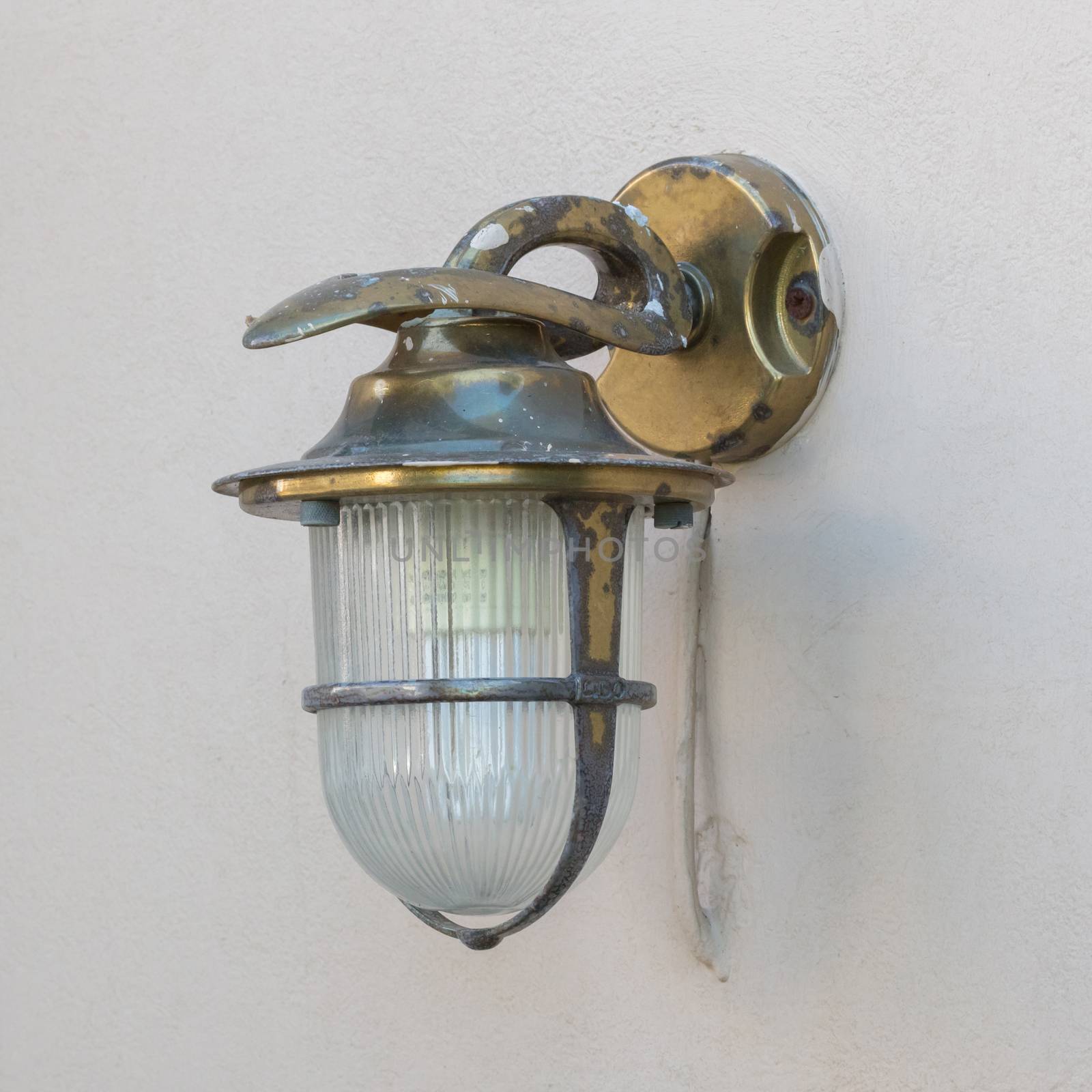 Vintage looking metal lantern with modern lamp  by michaklootwijk