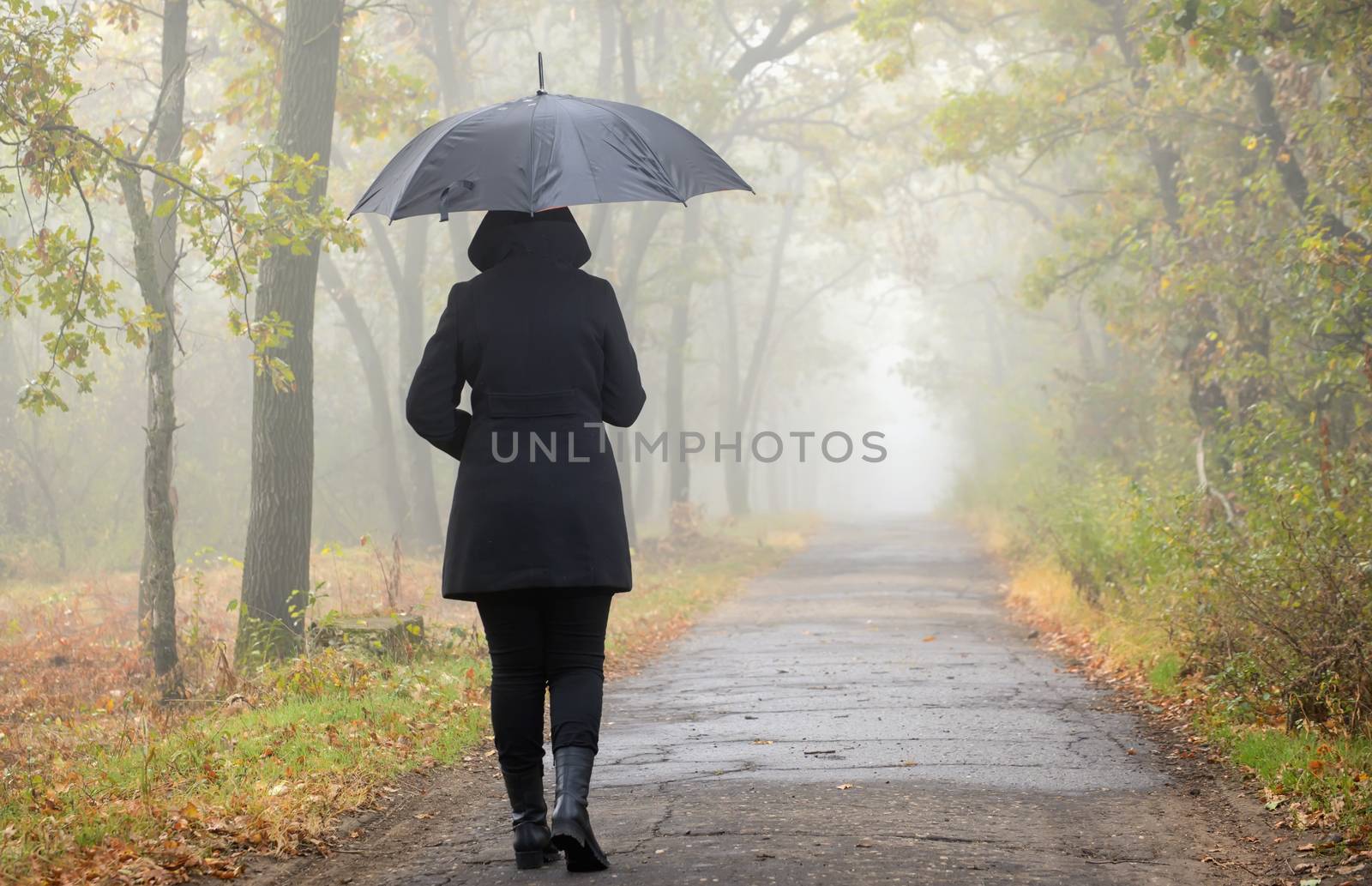 Woman with black umbrella by jordachelr