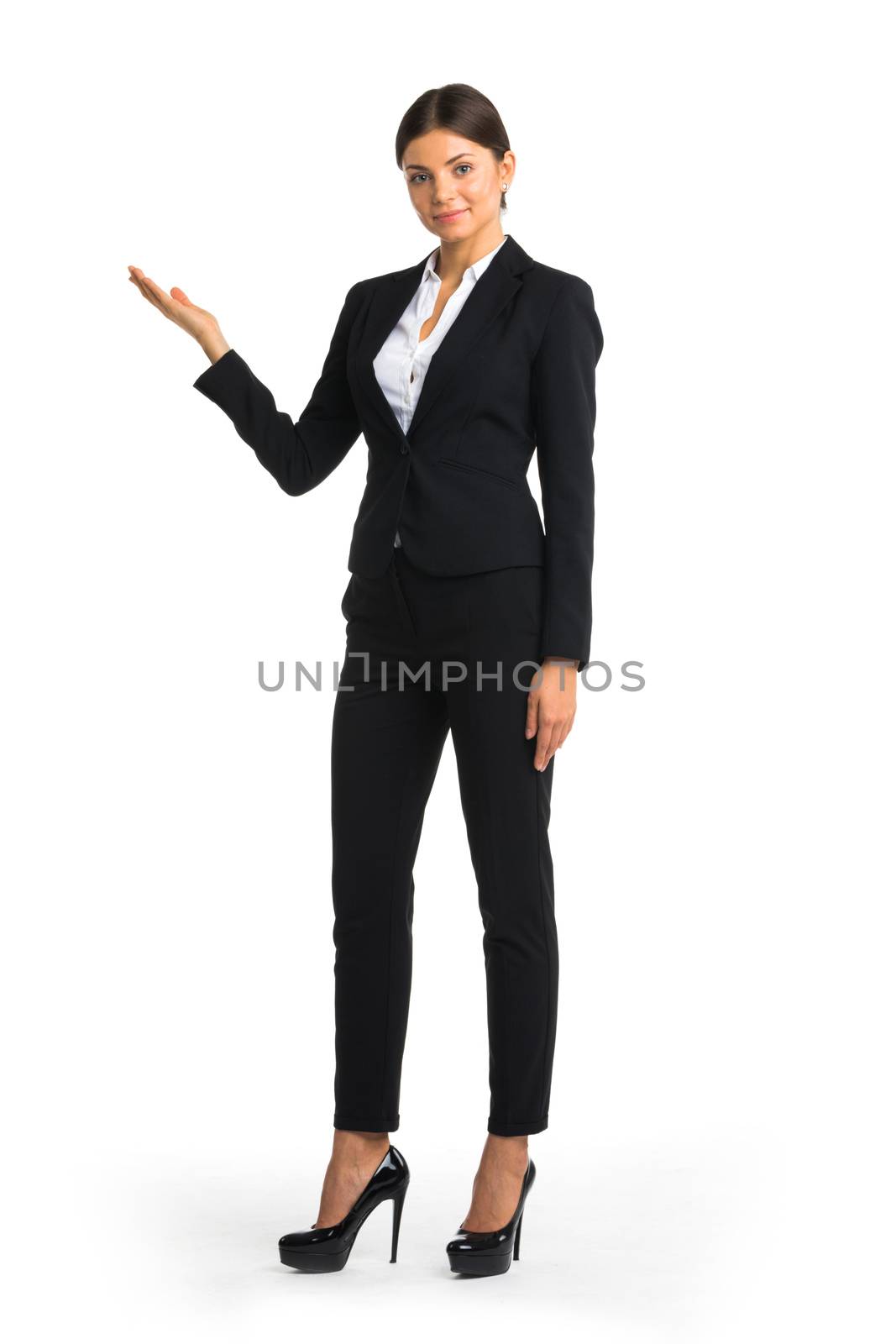 Business woman pointing showing copyspace, isolated on white background