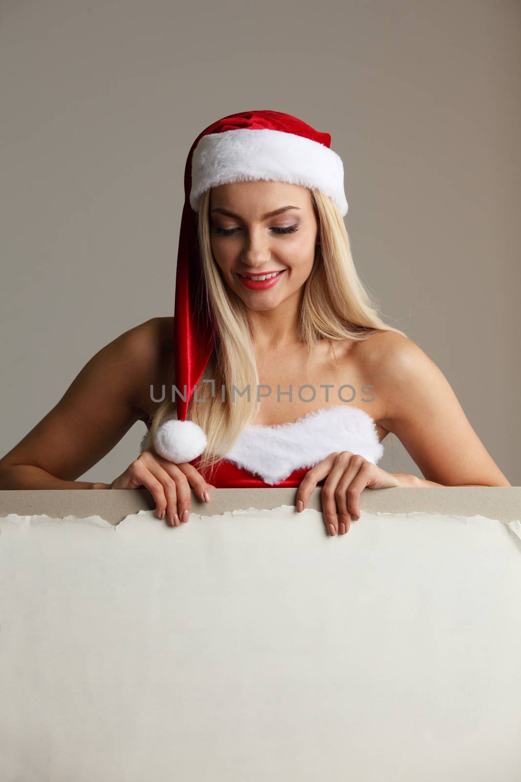 Santa girl holding blank billboard by ALotOfPeople