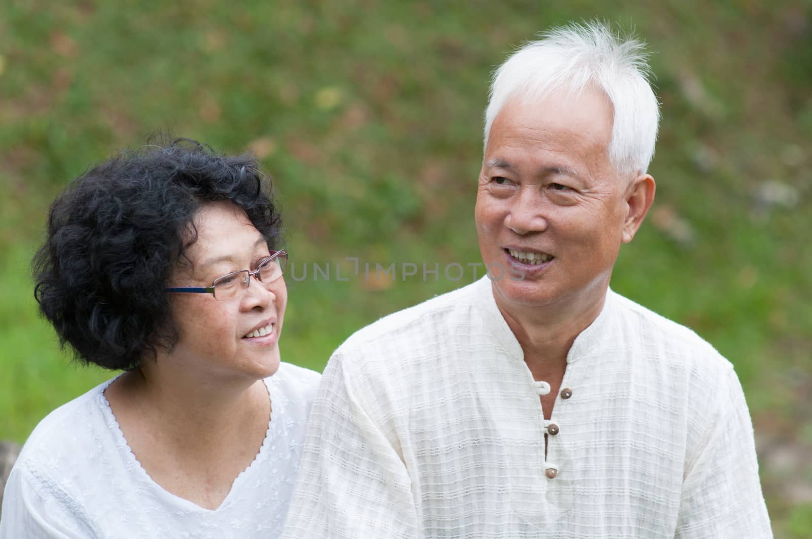 Mature Asian couple outdoor portrait. by szefei