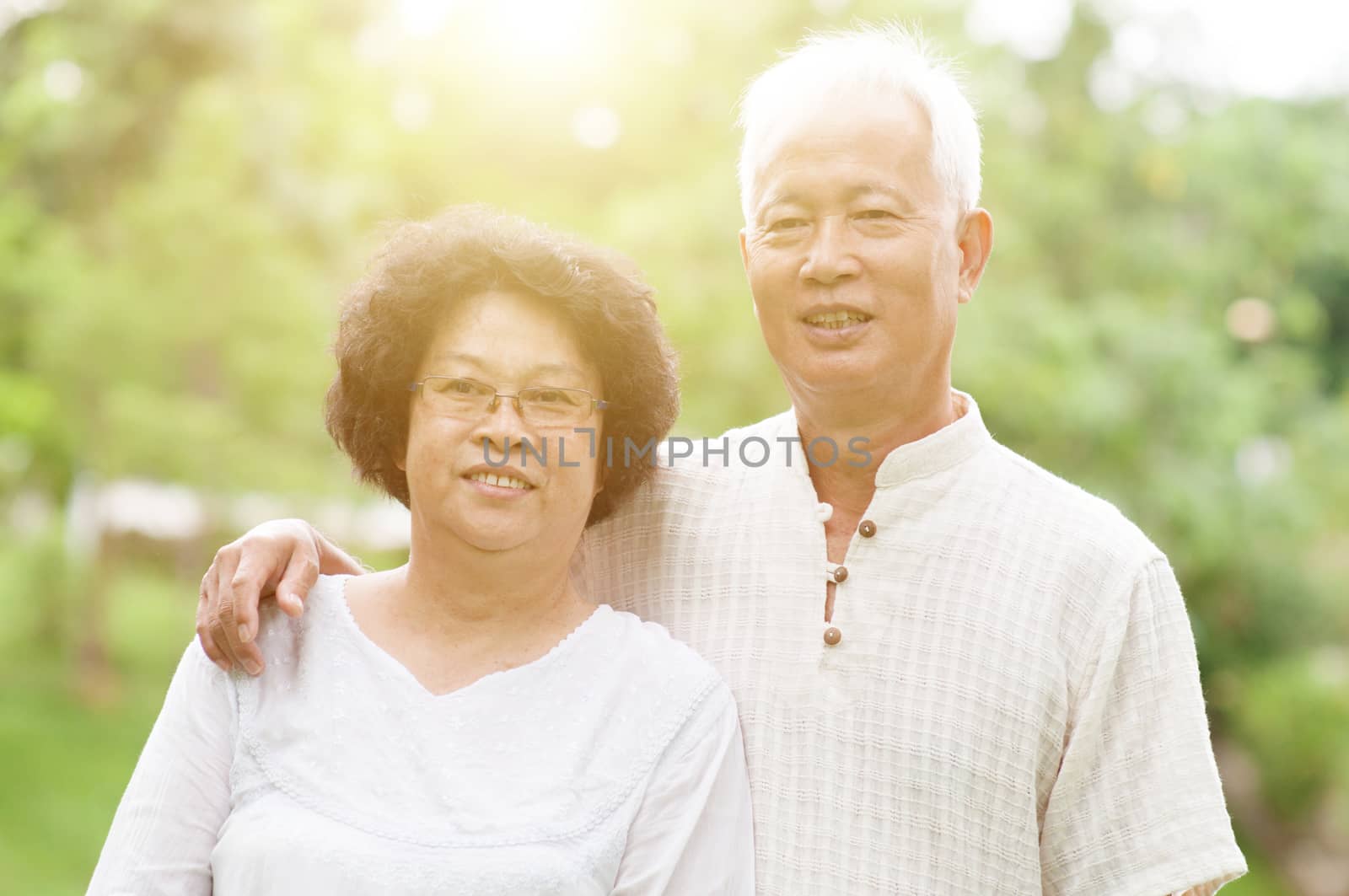 Happy senior Asian couple. by szefei