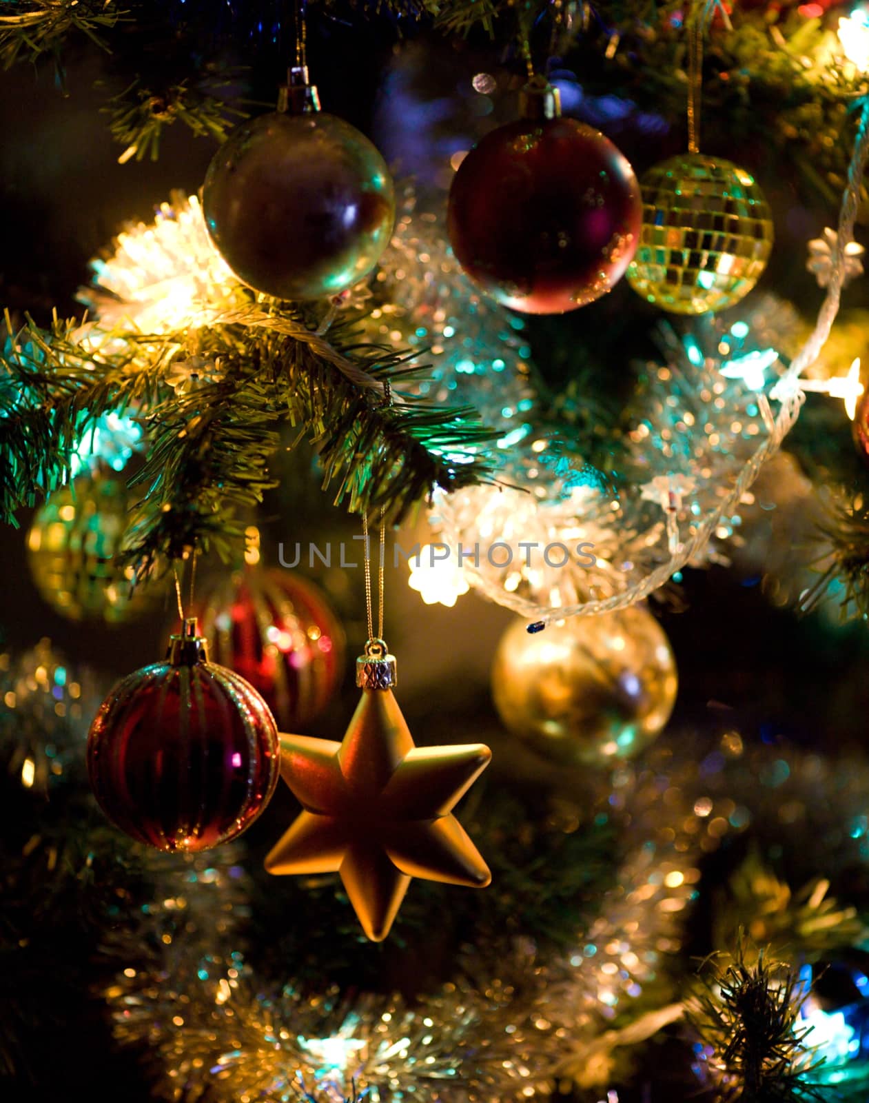 Christmas tree decorations with lights close up