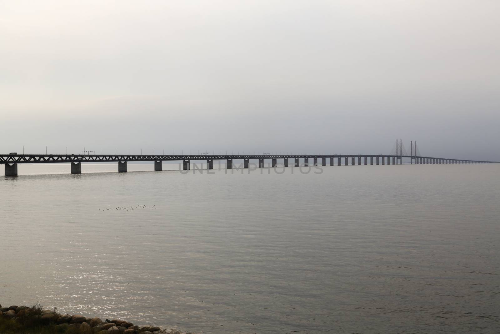 The Oresund Bridge connects Sweden and Denmark and is a combined twin-track railroad and four-lane highway bridge-tunnel across the Oresund strait. 