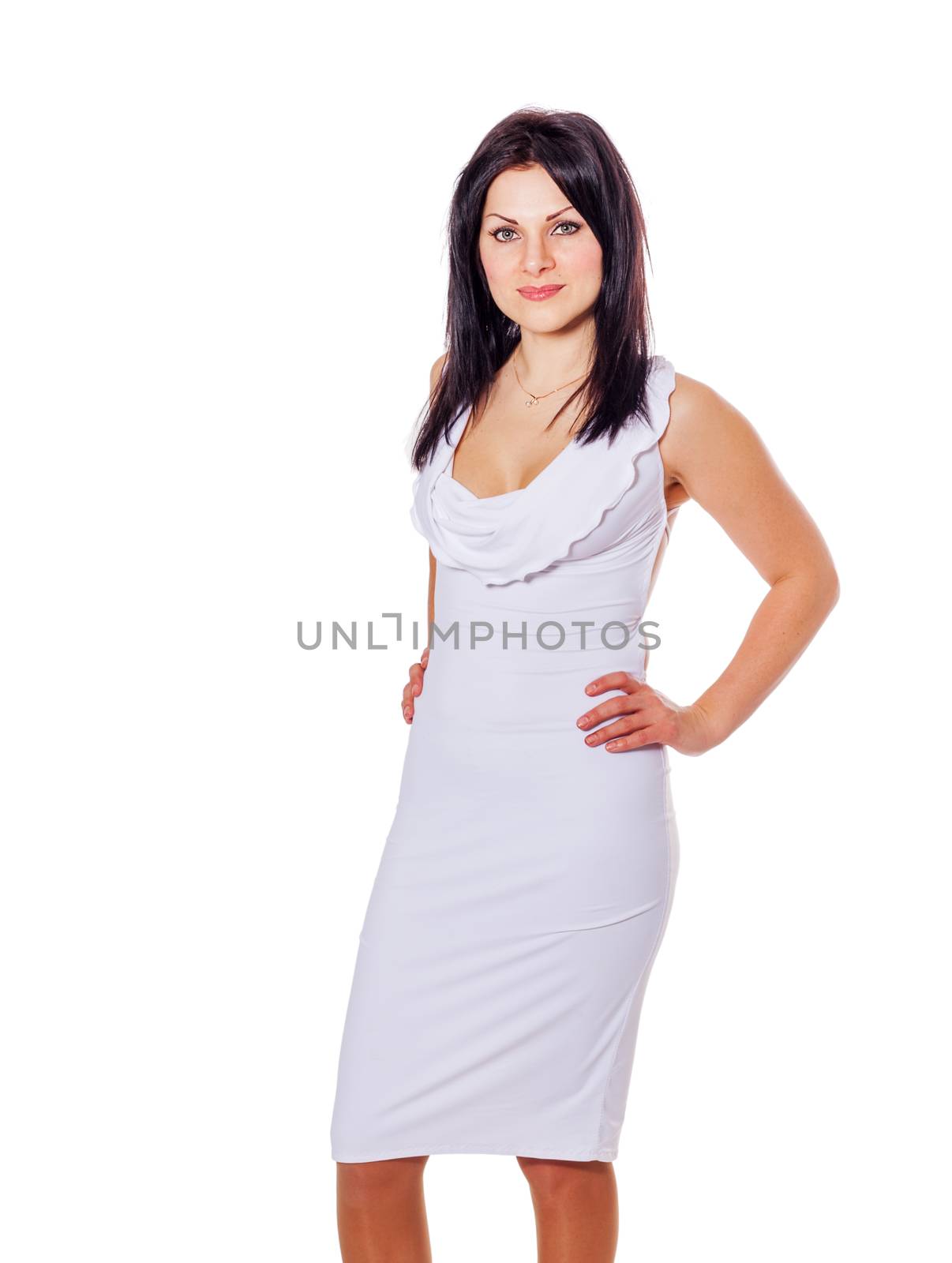 Elegant young woman posing against a white background