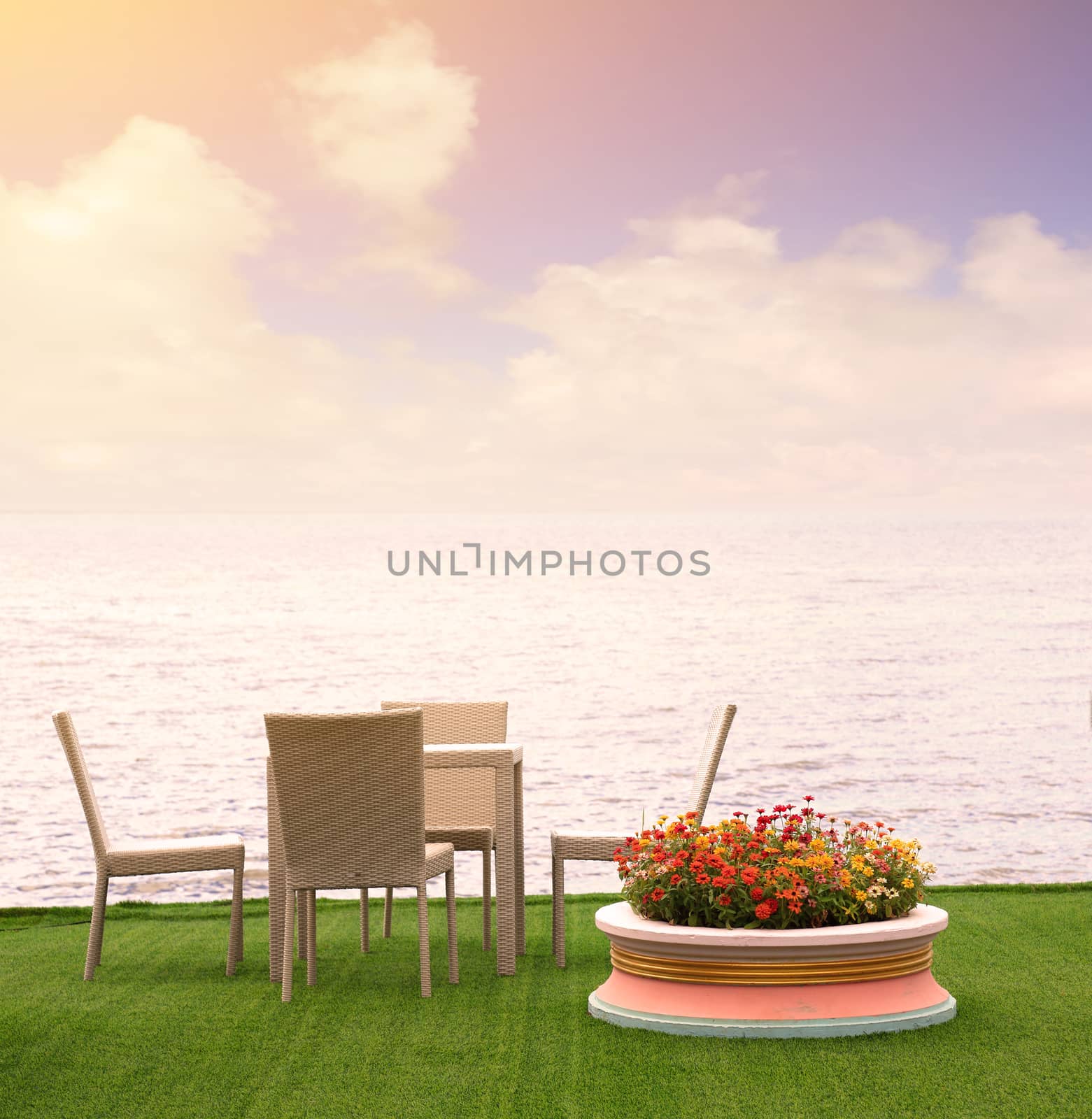 Rattan armchairs with sea view by phalakon