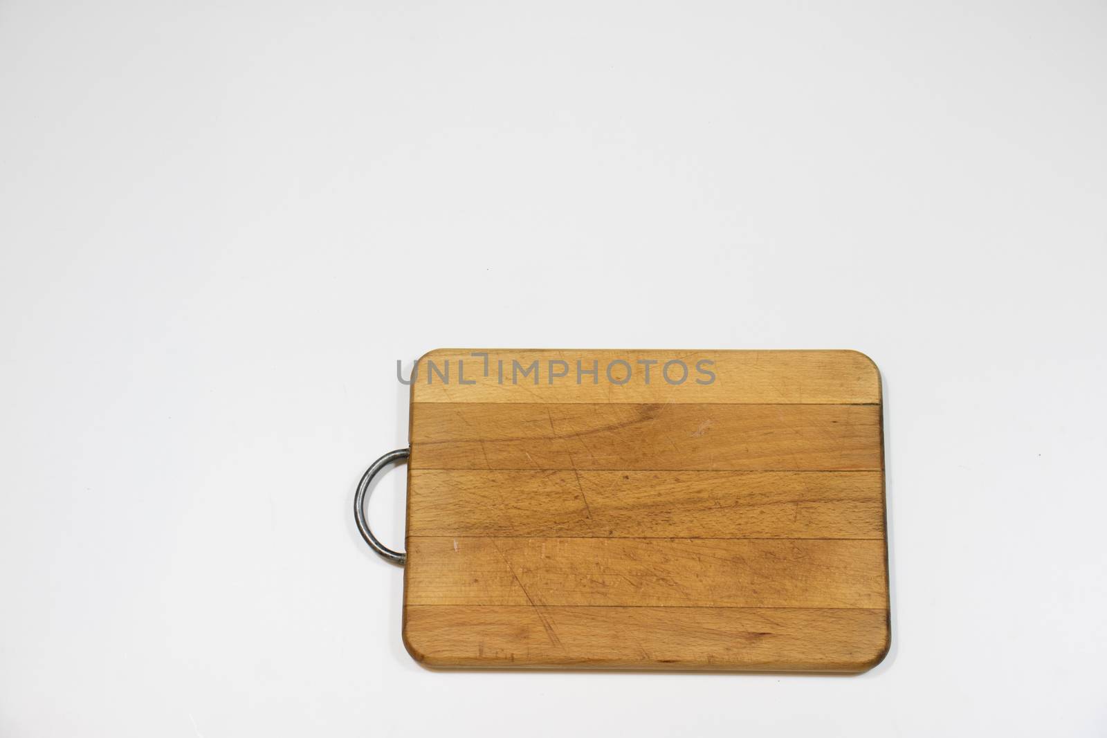 Old chopper and board, tools for butcher, white background.