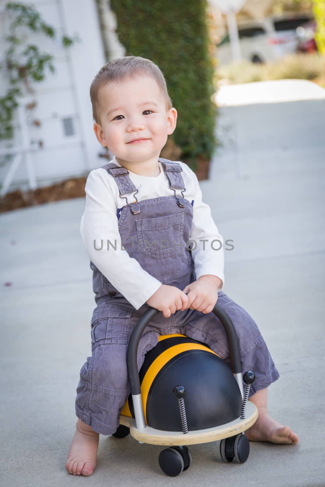 Young Mixed Race Chinese and Caucasian Baby Boy Having Fun Outdoors by Feverpitched