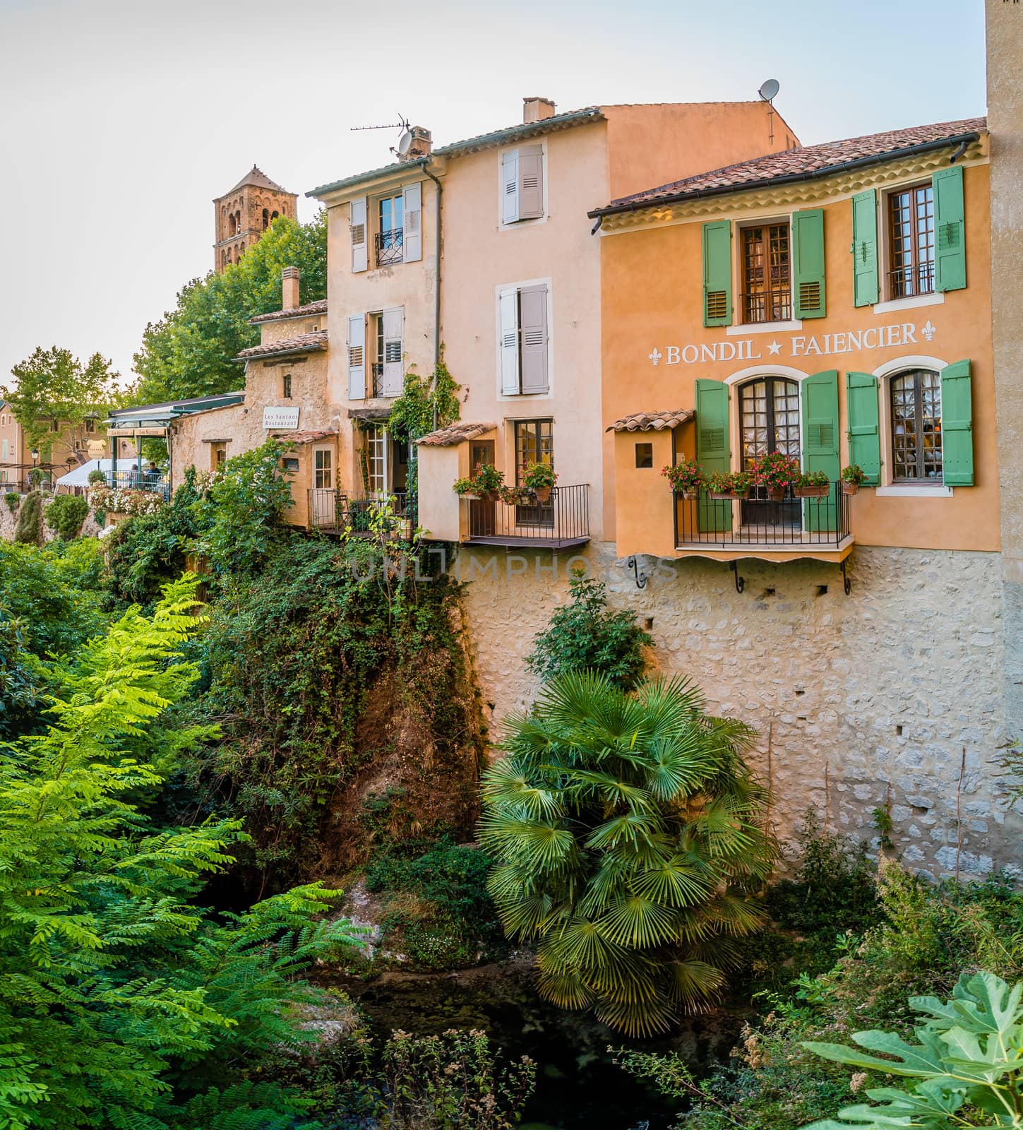 River and trees in the lovely village of Moustiers Sainte Marie in France