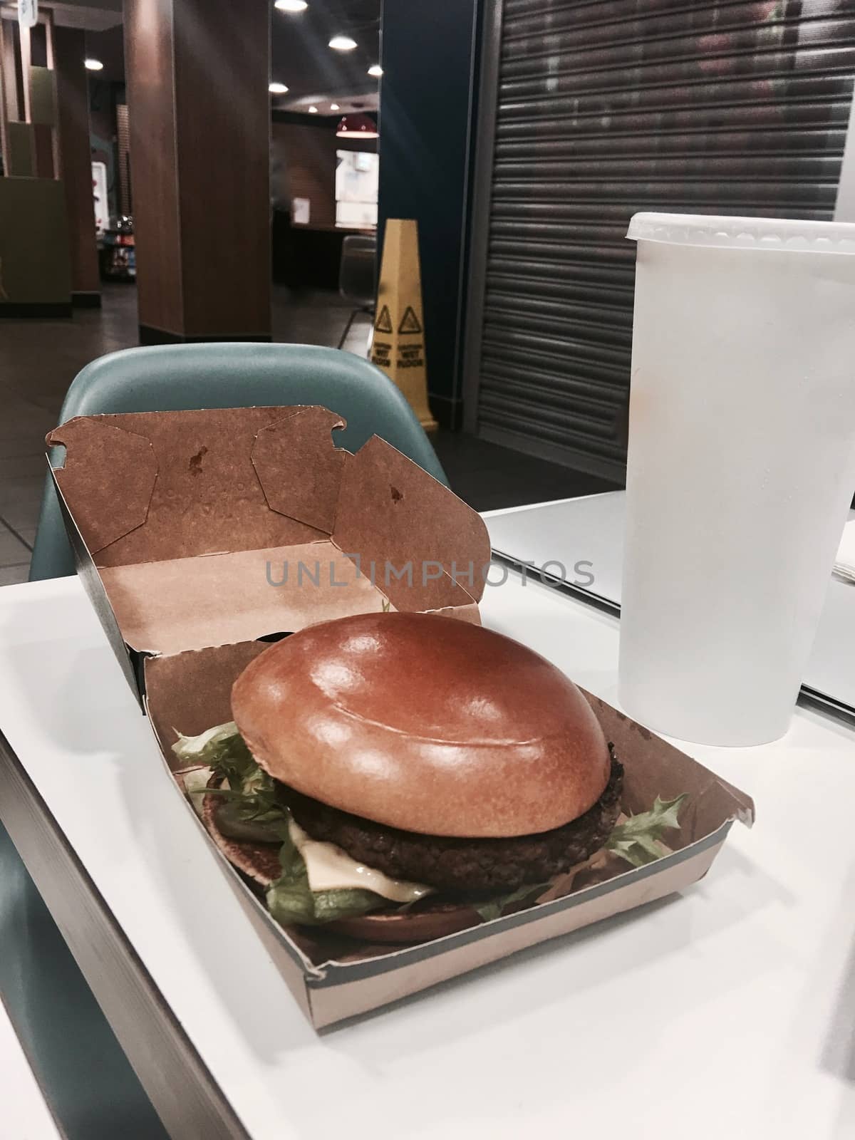 Delicious and fresh burger in a box. Restaurant fast food concept.