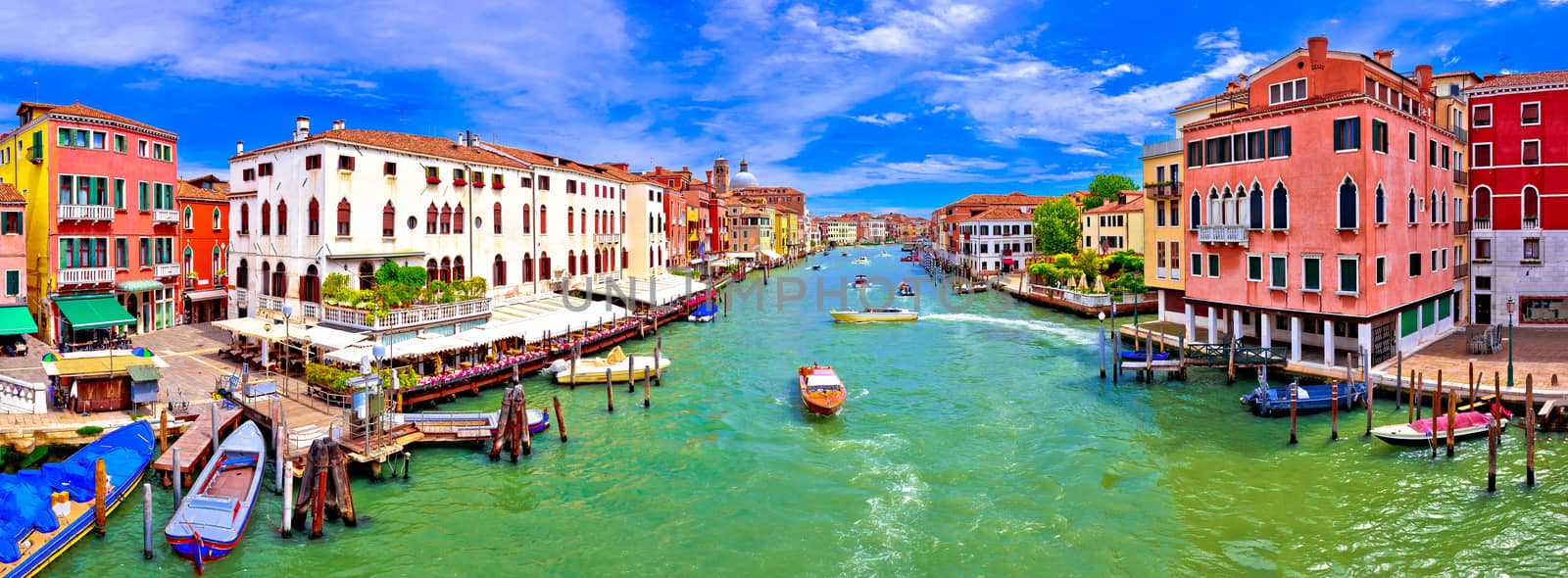 Colorful Canal Grande in Venice panoramic view, tourist destination in Veneto region of Italy