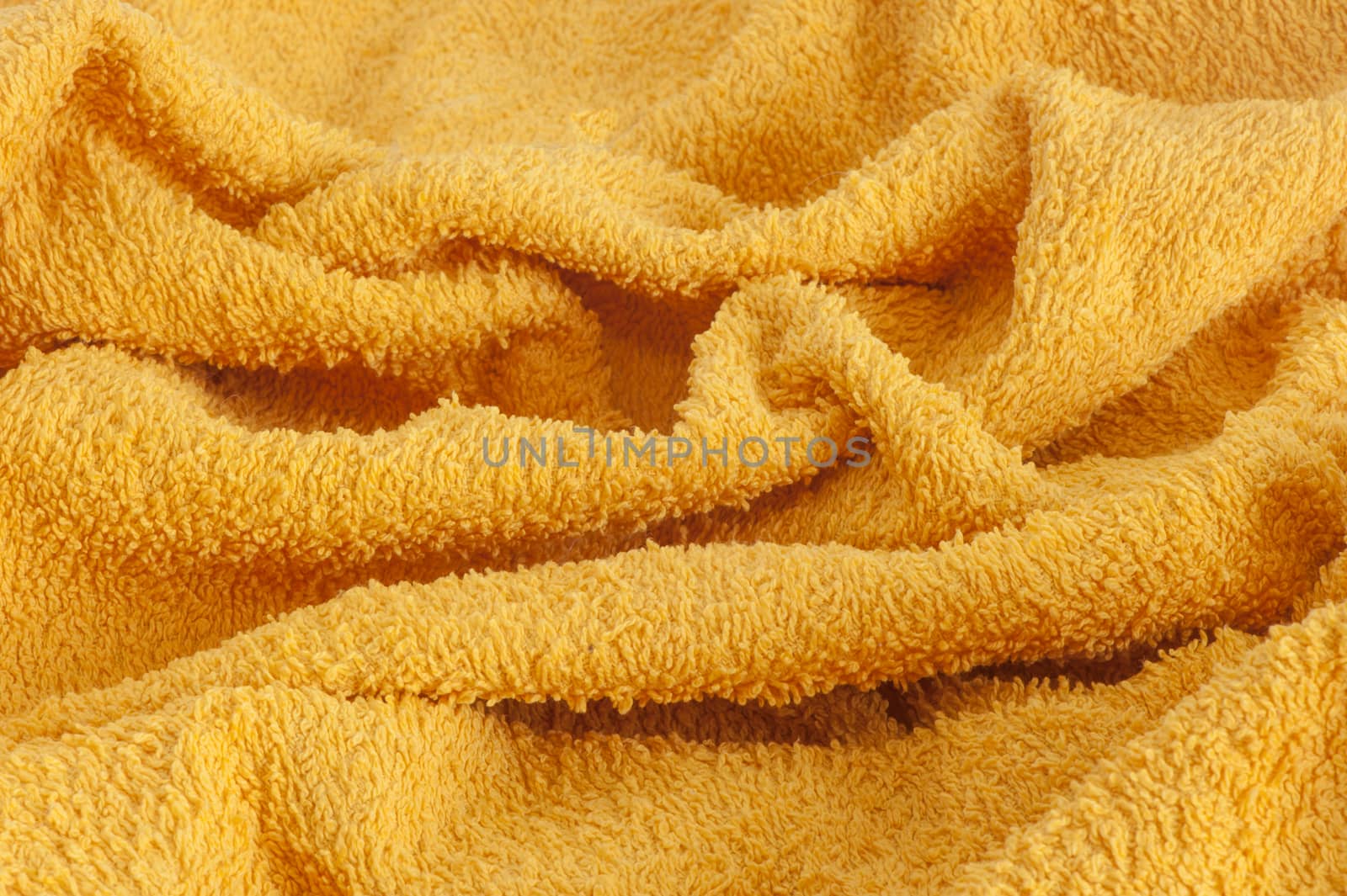 a background in a towel yellow towel

