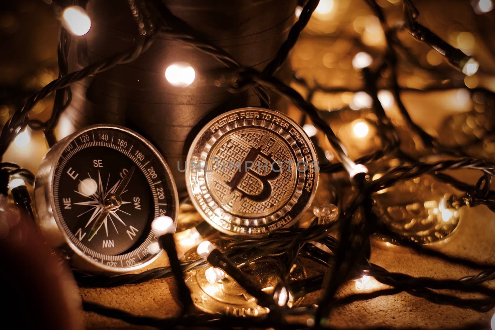 Digital currency physical metal bitcoin coin. Christmas cryptocurrency concept.