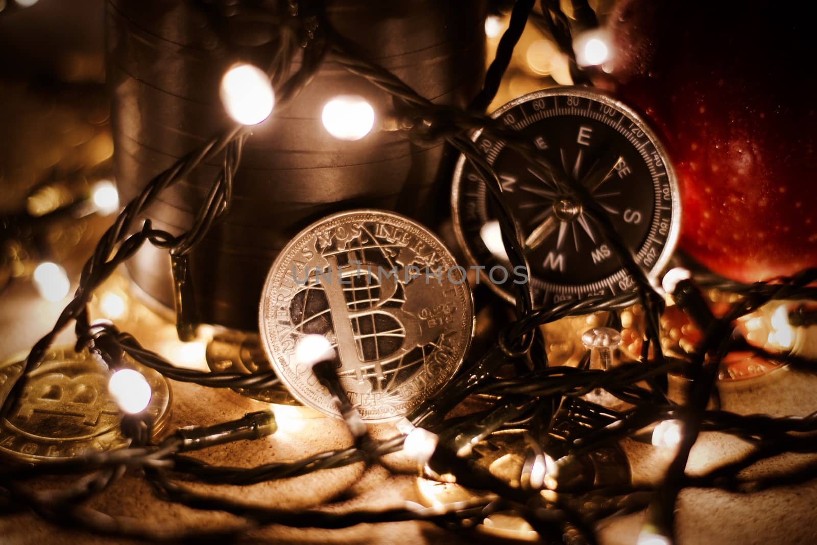 Digital currency physical metal bitcoin coin. Christmas cryptocurrency concept.