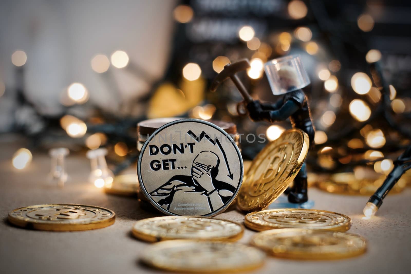 Digital currency physical metal coin. Christmas cryptocurrency concept.