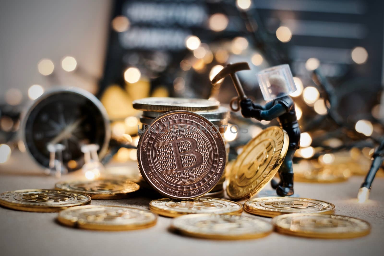 Digital currency physical metal coin. Christmas cryptocurrency concept.