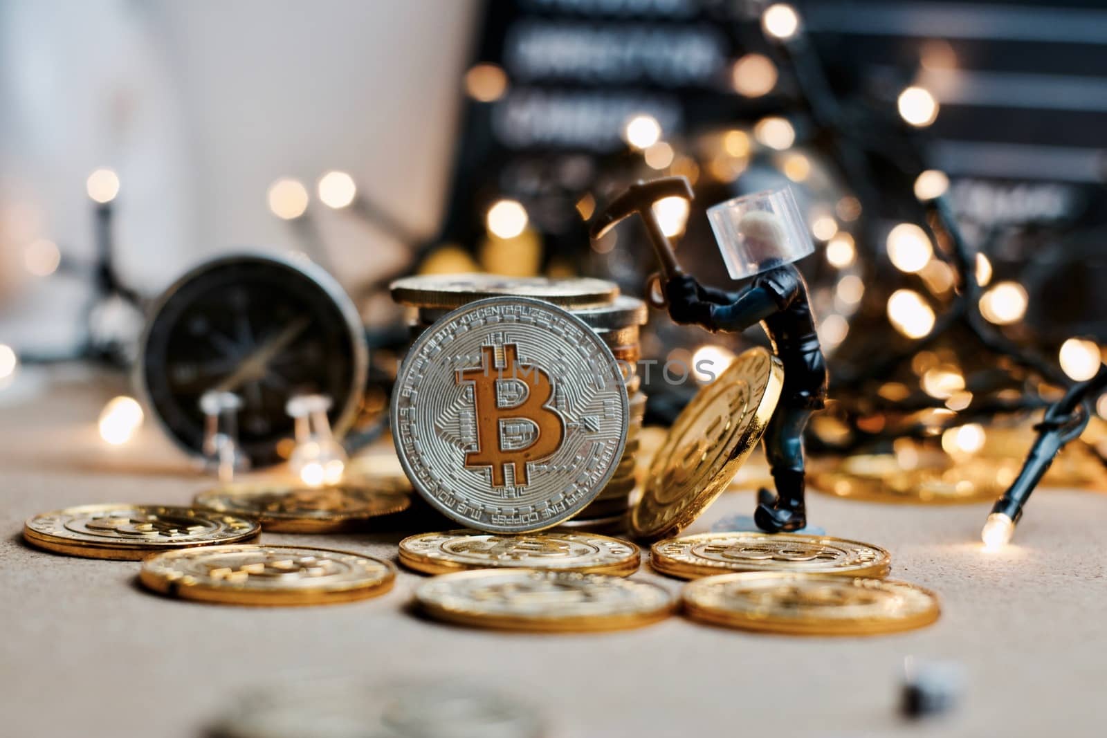 Digital currency physical metal coin. Christmas cryptocurrency concept.