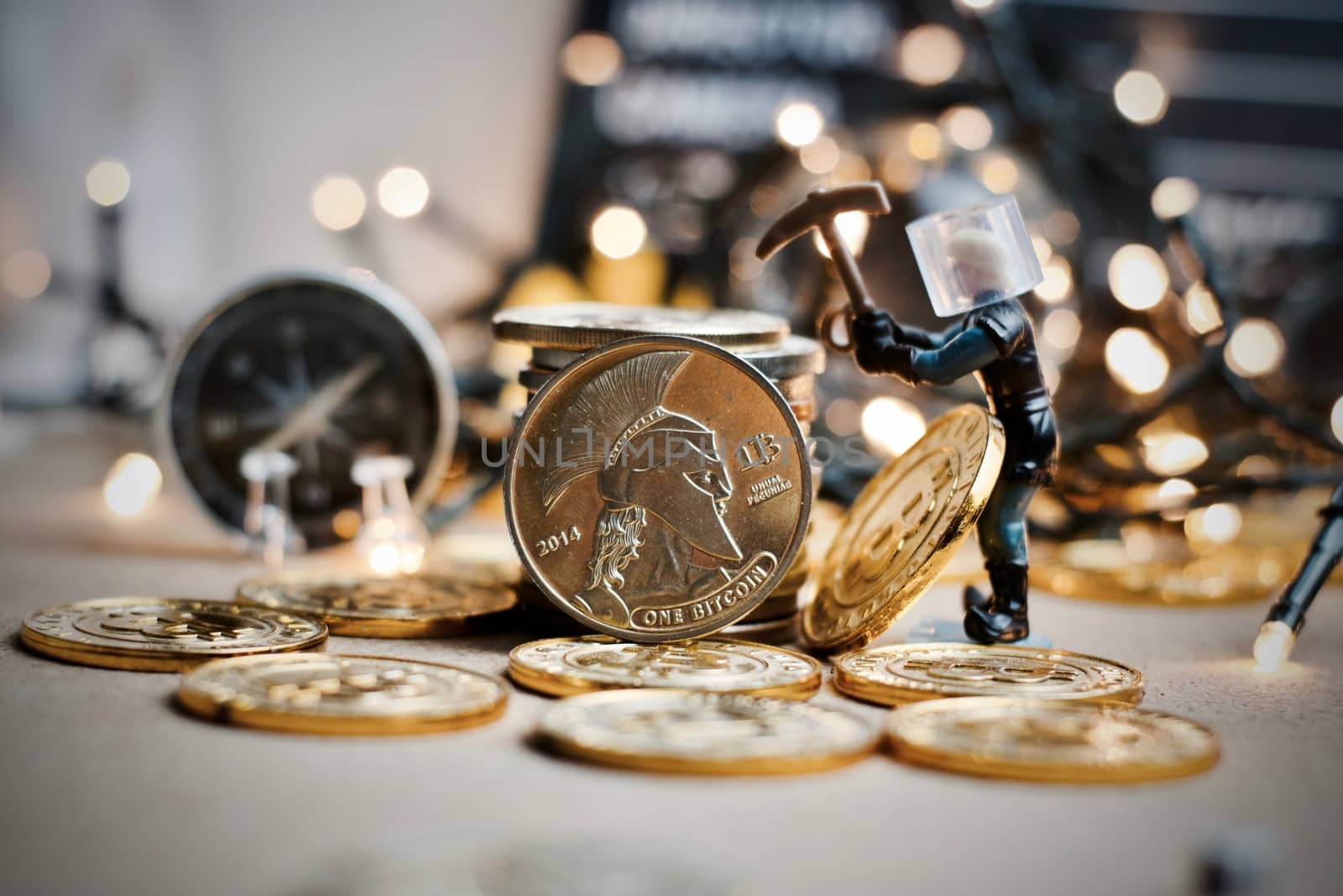 Digital currency physical metal coin. Christmas cryptocurrency concept.