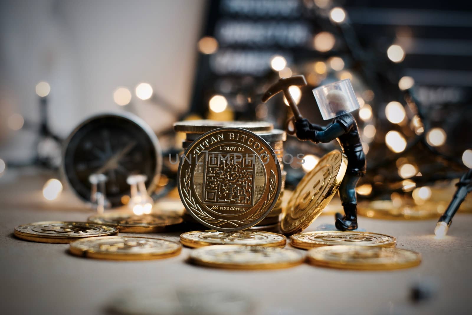 Digital currency physical metal coin. Christmas cryptocurrency concept.