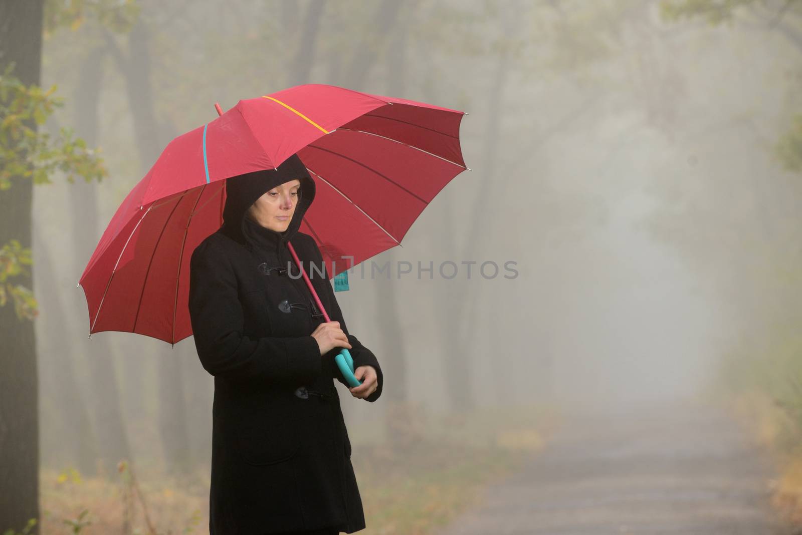 Woman with red umbrella  by mady70