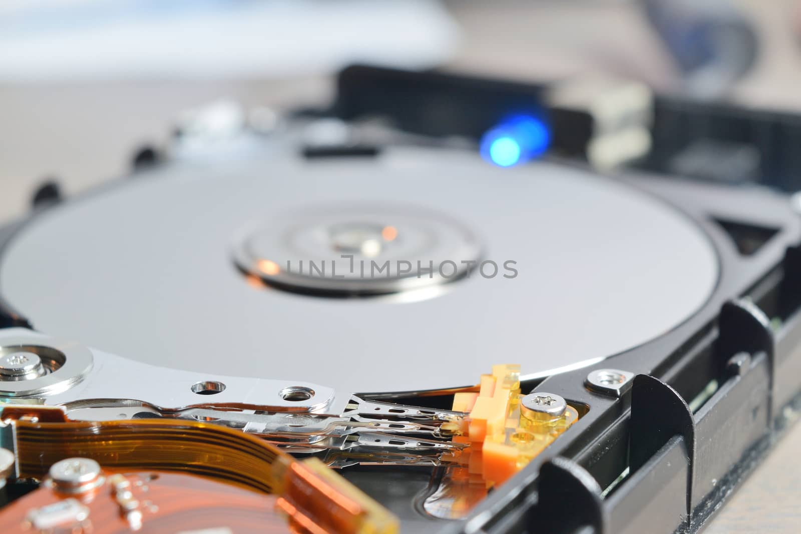 close up of a hard disk inside by solosergio