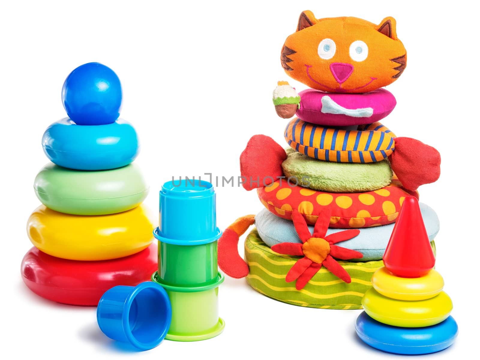 Set of different baby pyramid toys - plastic rings pyramid, cloth pyramid, plastic cup pyramid. Isolated on white with clipping path.