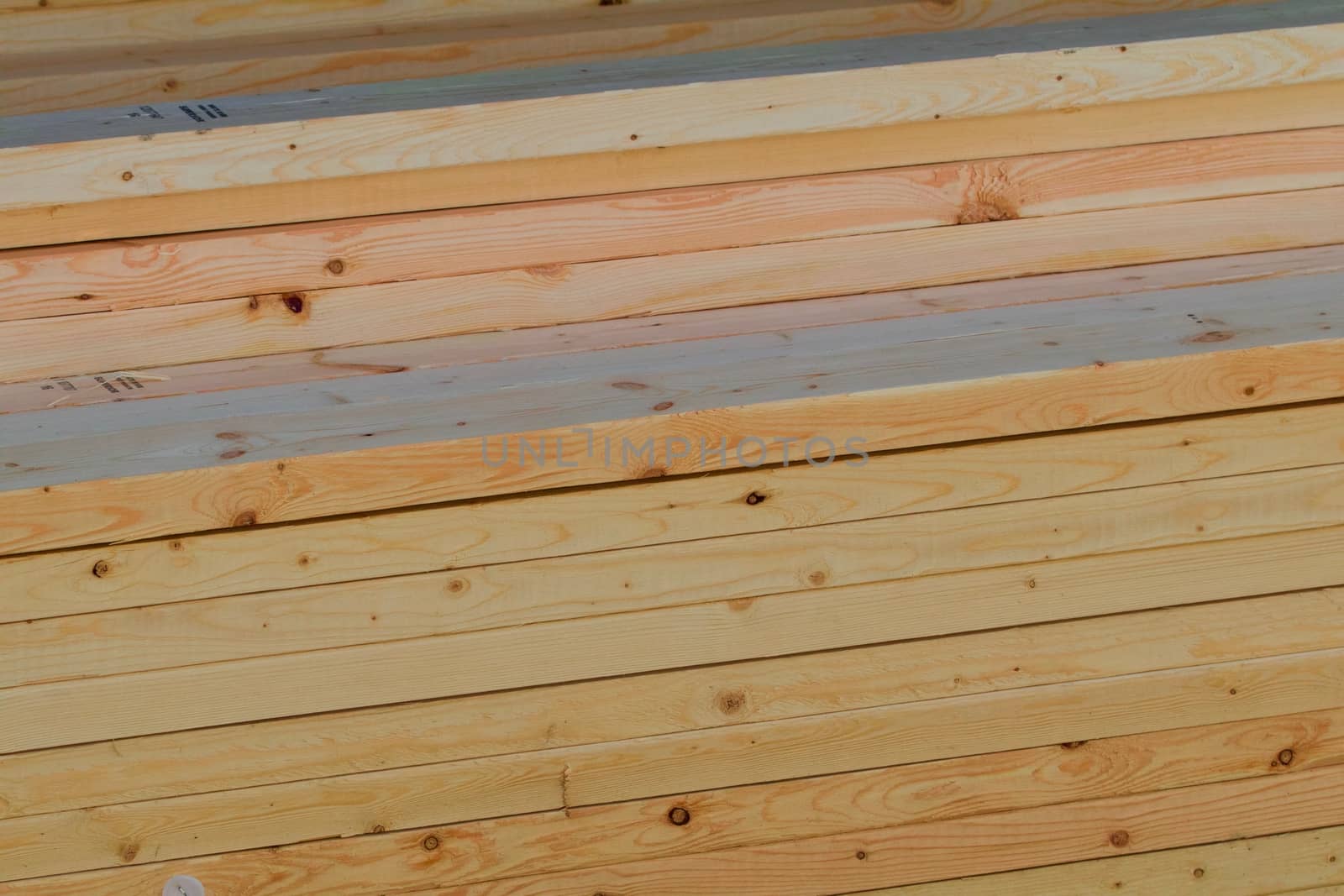 Side view of stacked planks
