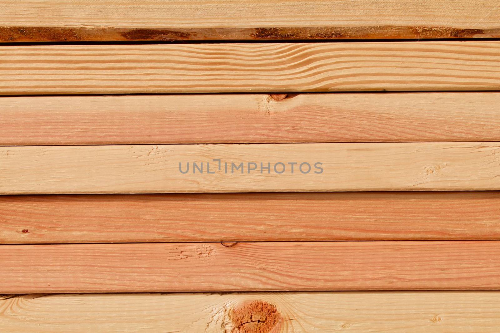 Stacked pine planks on side