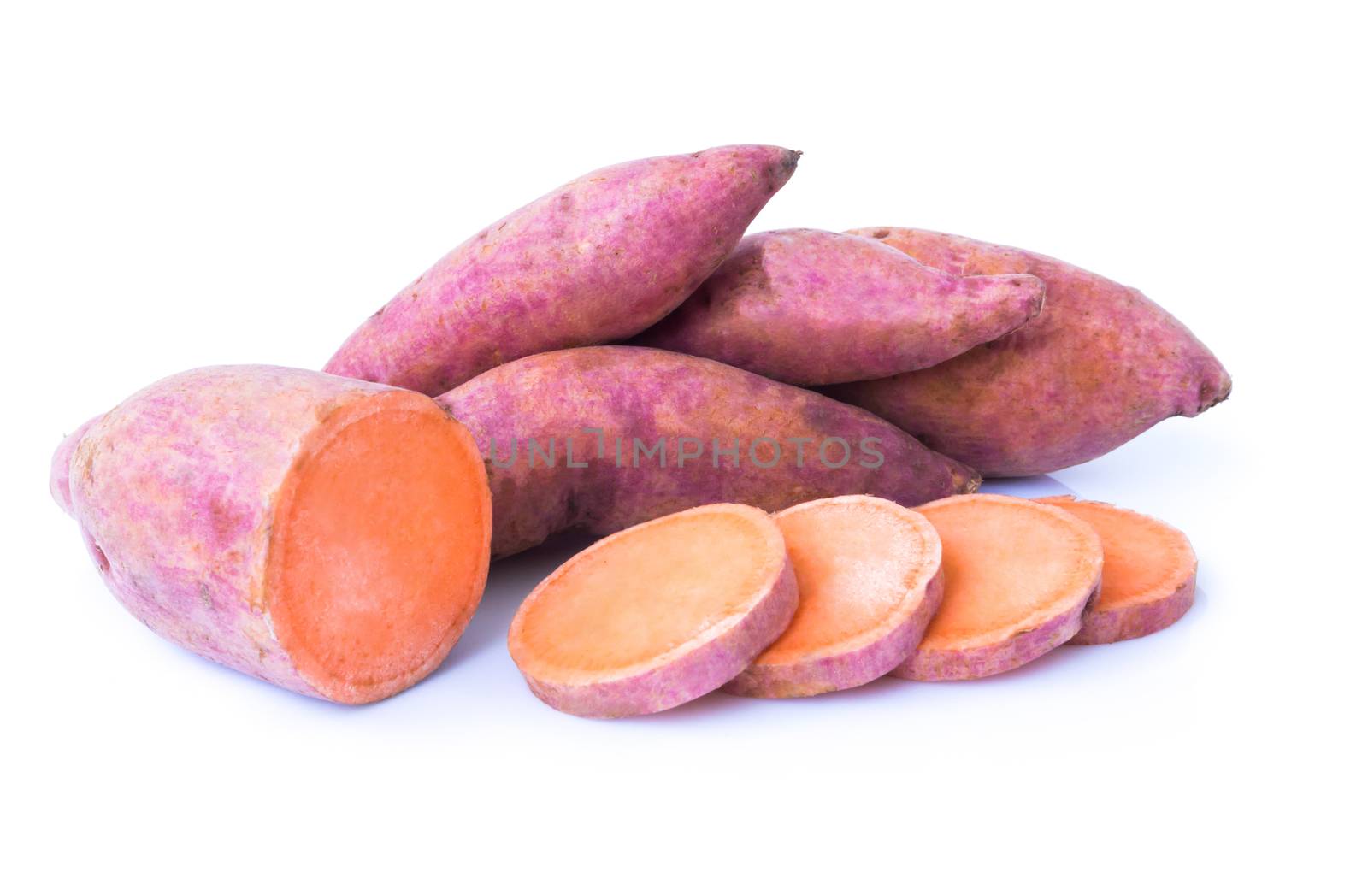 Sweet potato with slices on white background, raw food