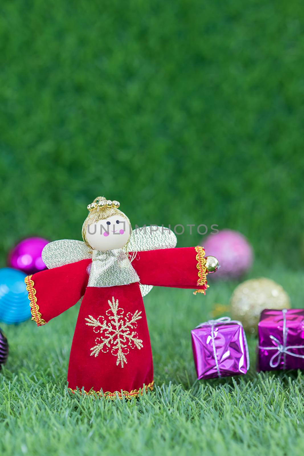 Celebration of New year and Christmas,Close up Christmas decoration on green grass background with copy space