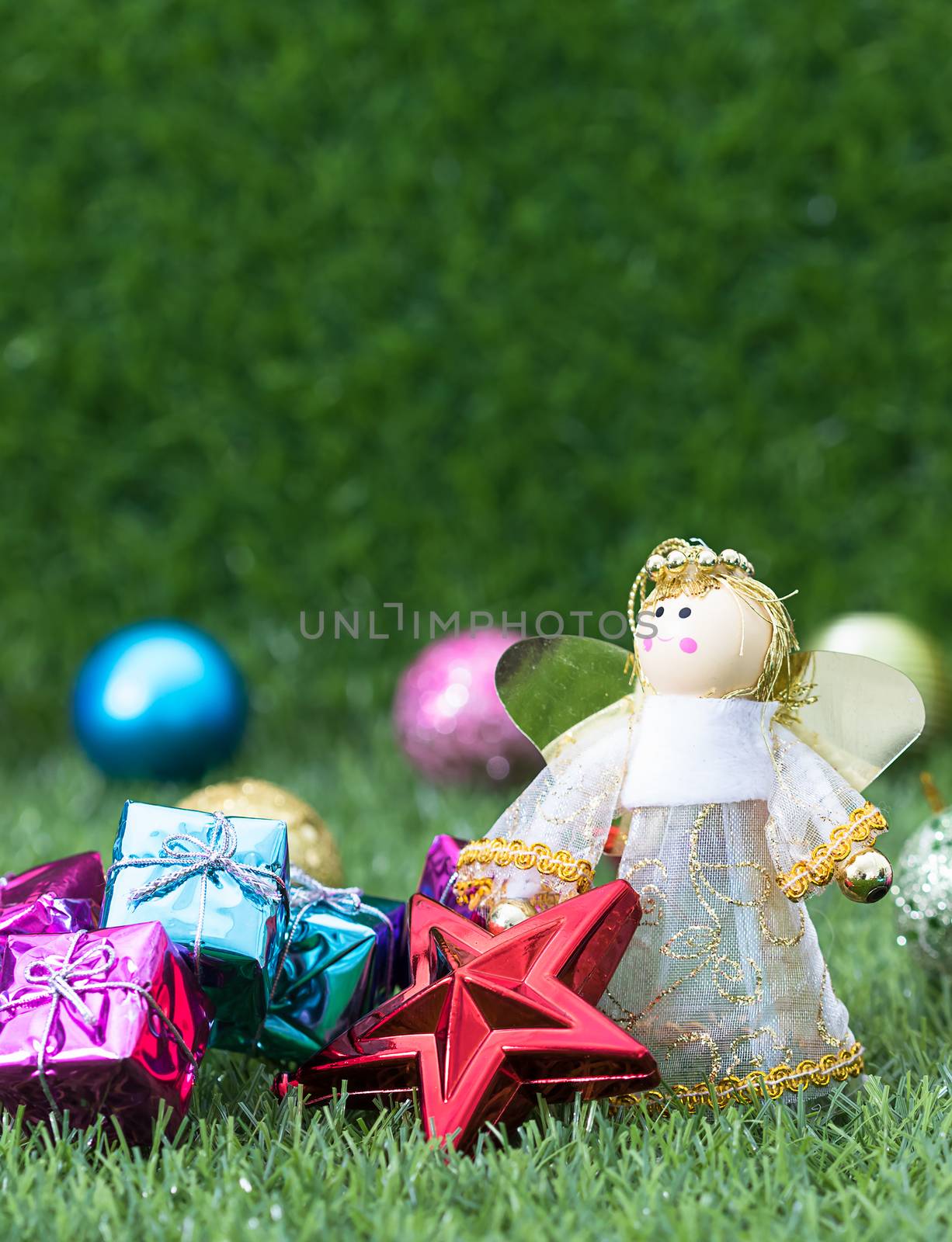 Celebration of New year and Christmas,Close up Christmas decoration on green grass background with copy space