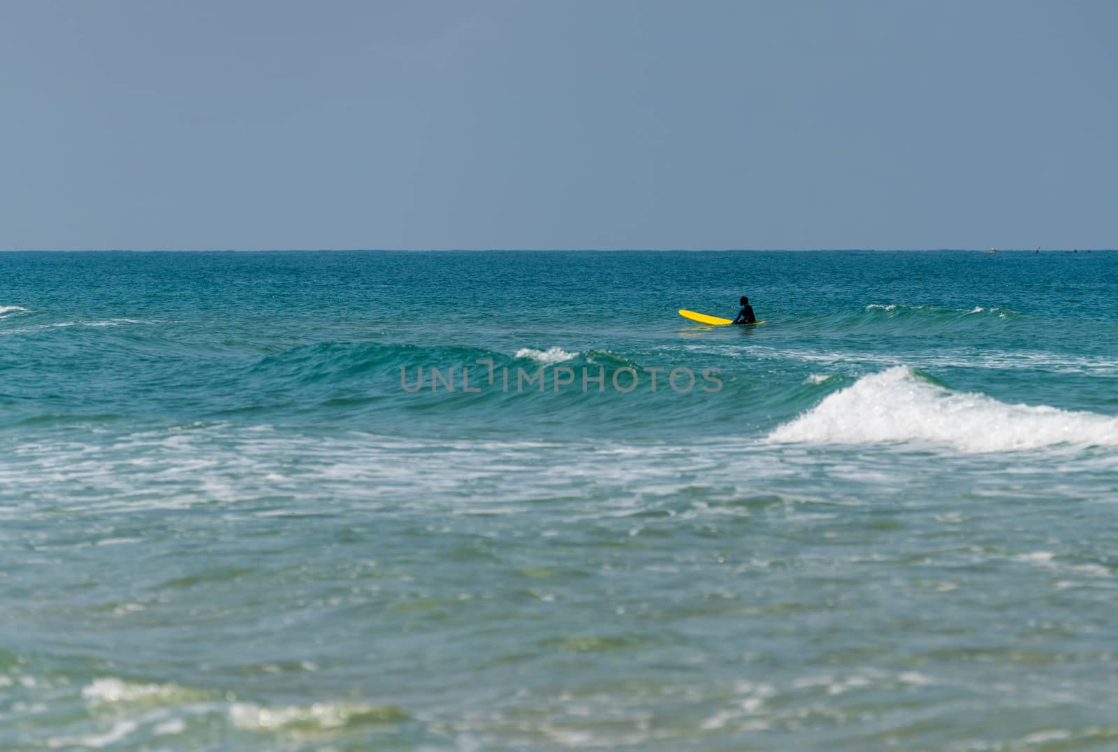 sea landscape man on a surf in the sea