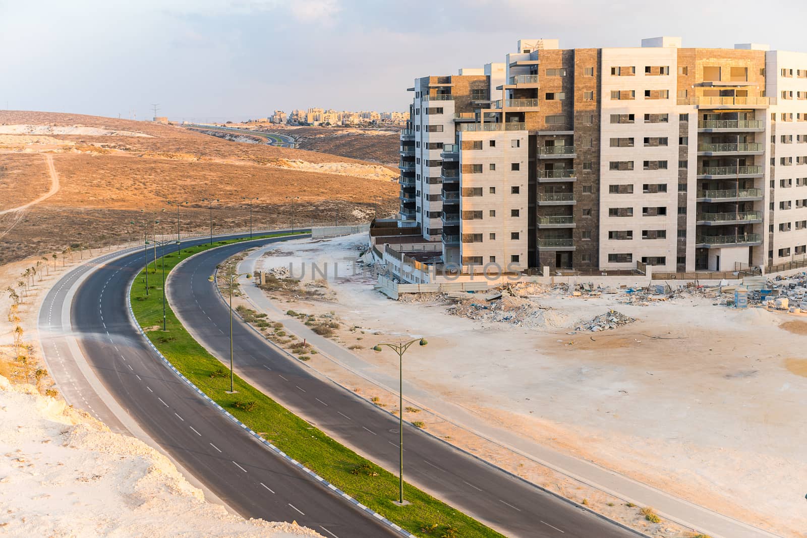 construction work in the desert, new building and a road