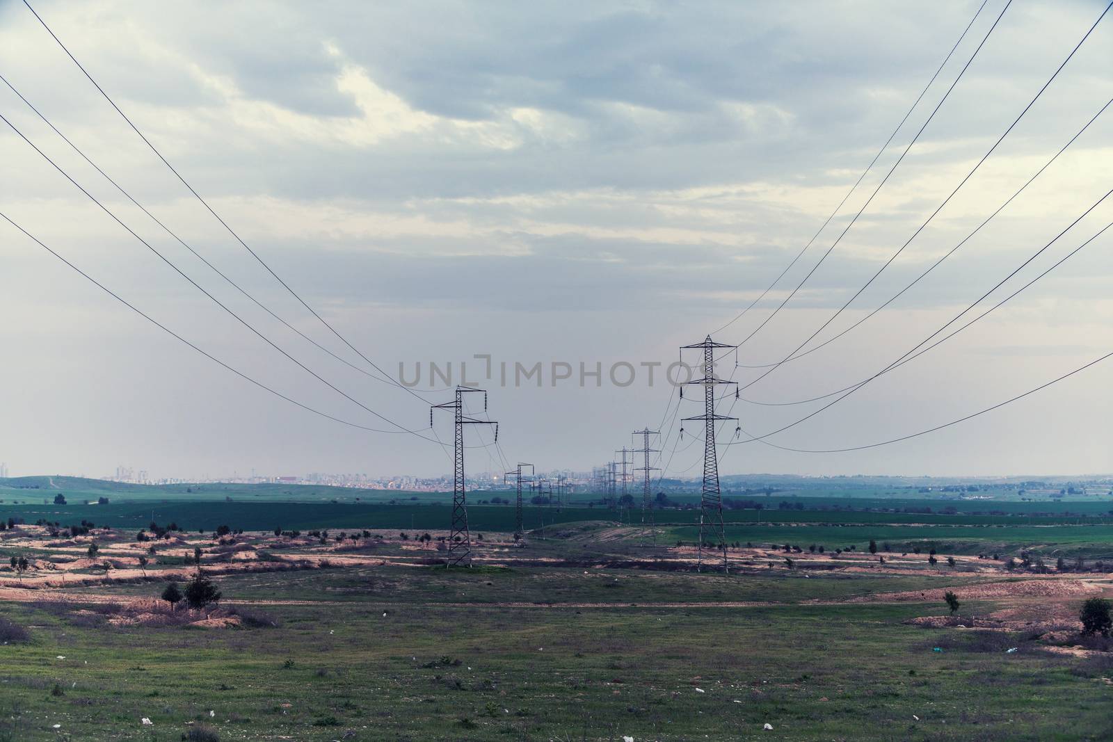 industrial landscape, high voltage poles with wires