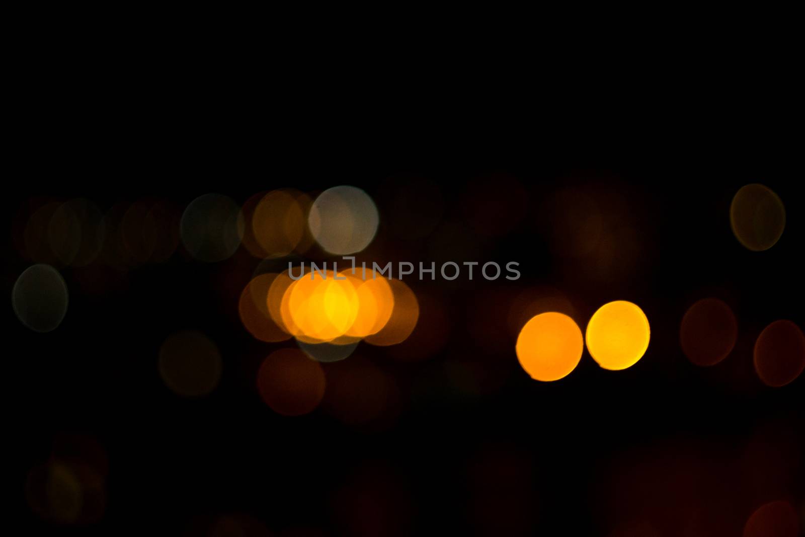 yellow lights on a black background abstraction night city