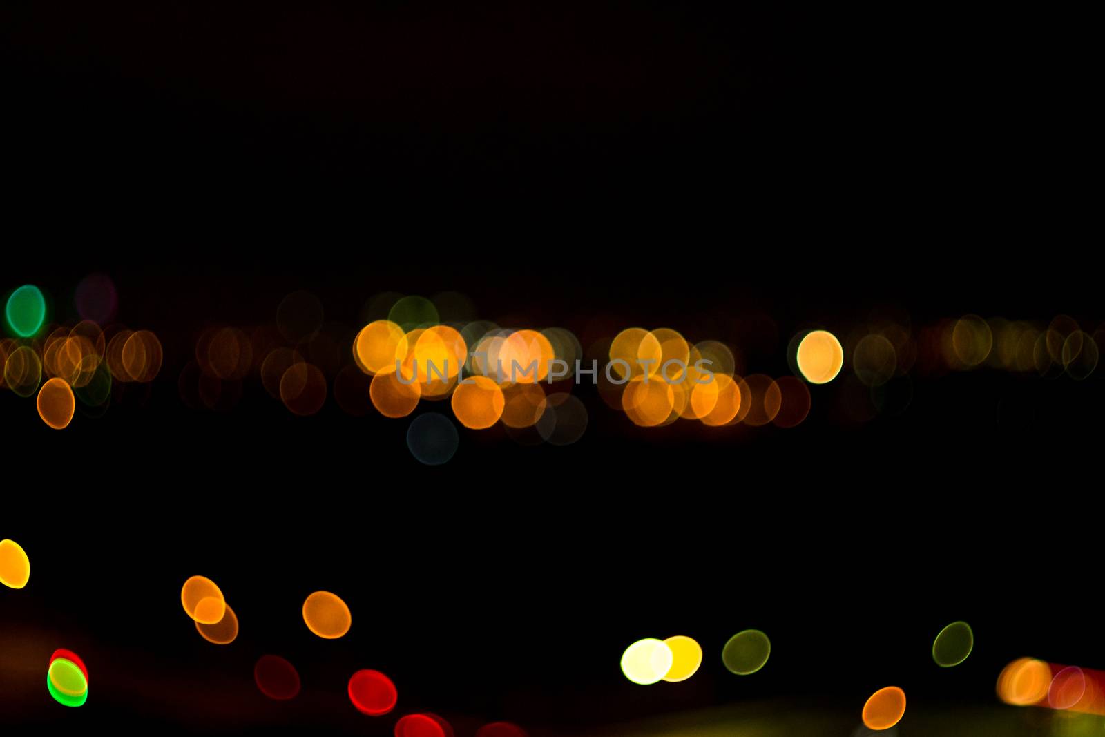 yellow lights on a black background abstraction night city