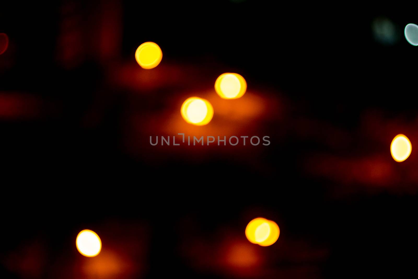 yellow lights on a black background abstraction night city