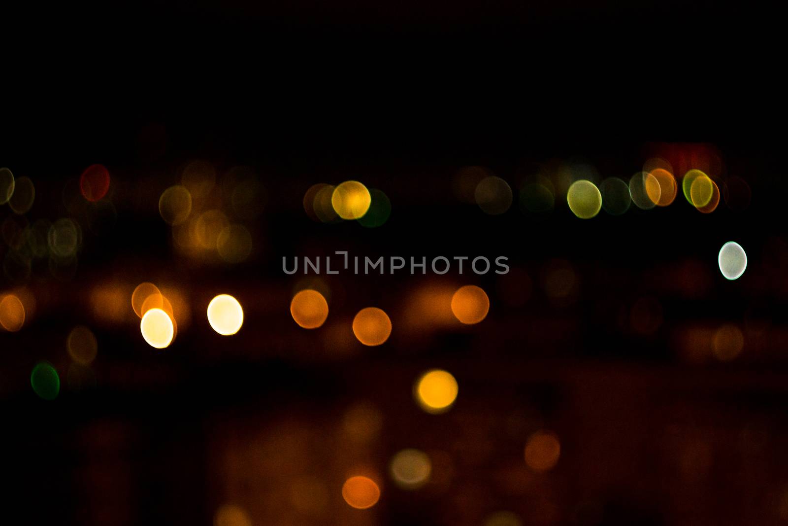 yellow lights on a black background abstraction night city