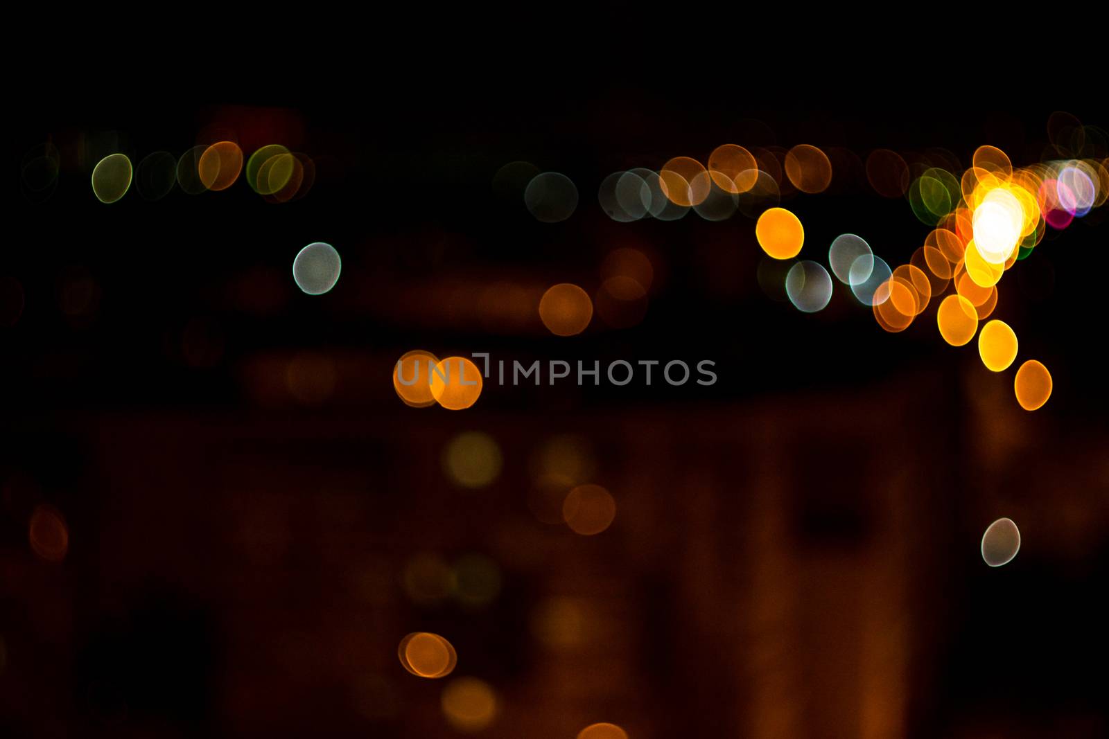 yellow lights on a black background abstraction night city