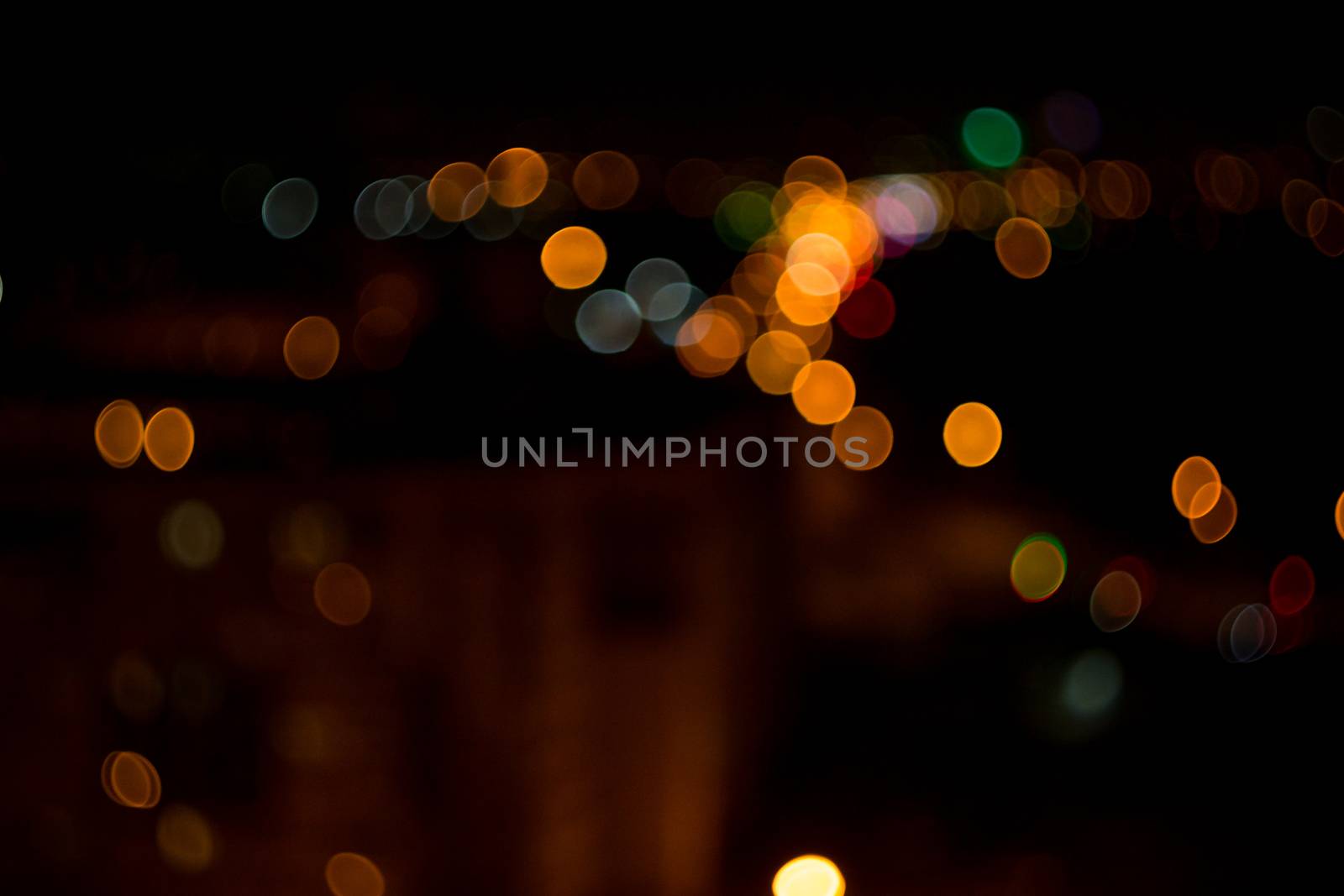 yellow lights on a black background abstraction night city