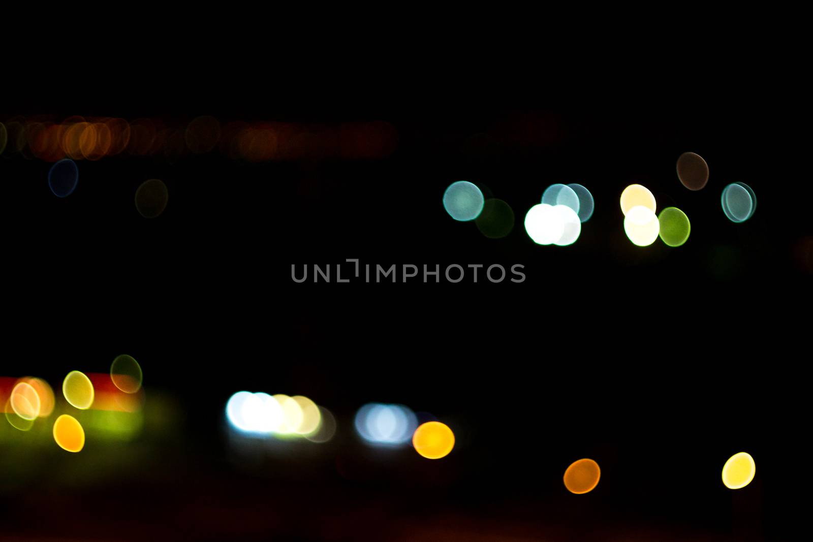 yellow lights on a black background abstraction night city