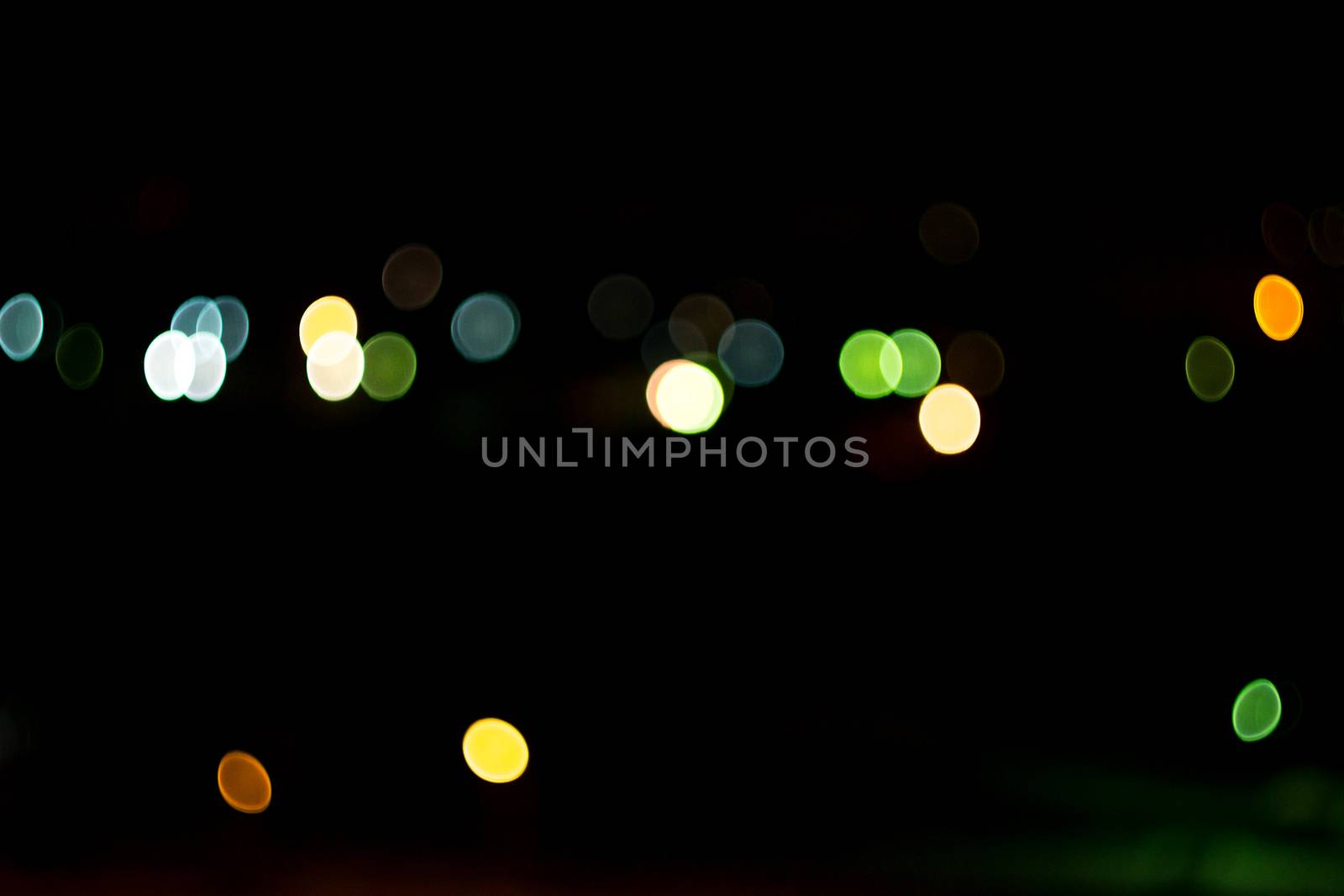 yellow lights on a black background abstraction night city