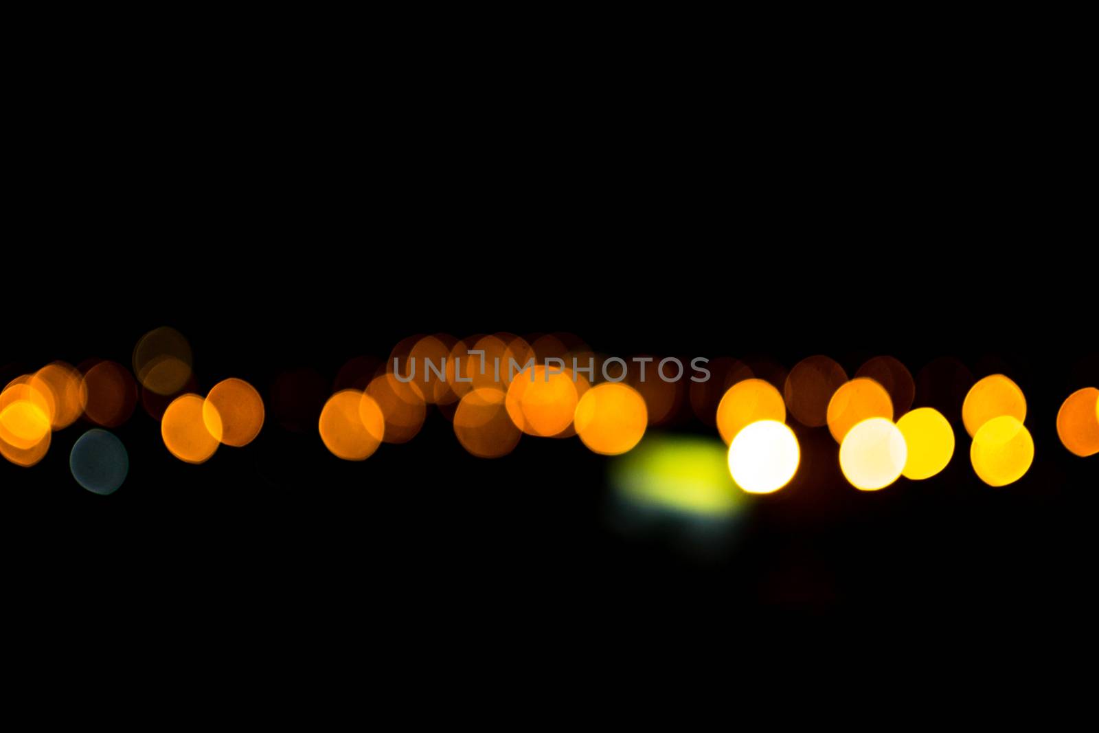 yellow lights on a black background abstraction night city