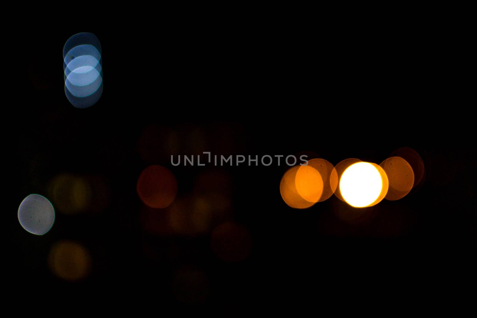 yellow lights on a black background abstraction night city