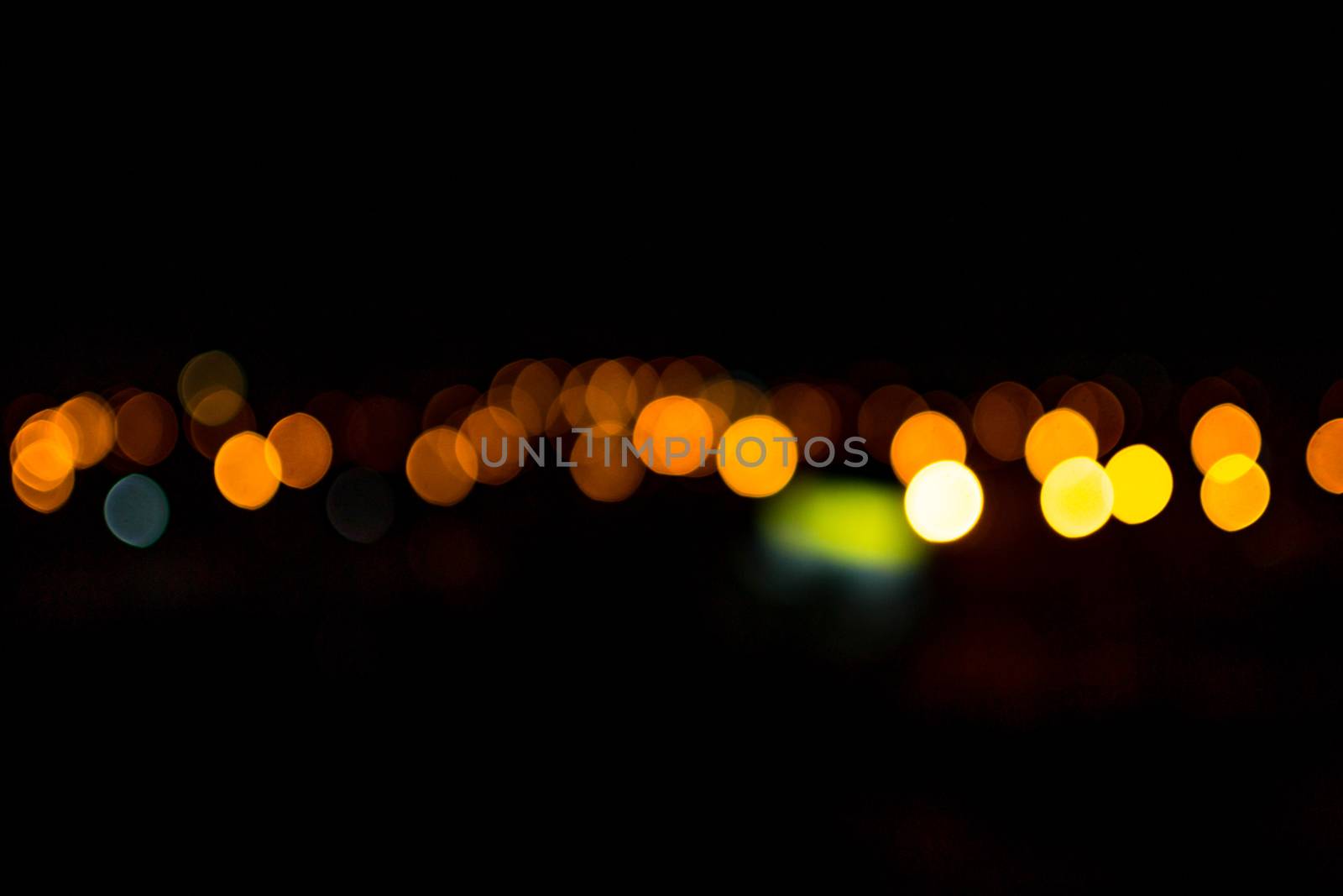 yellow lights on a black background abstraction night city