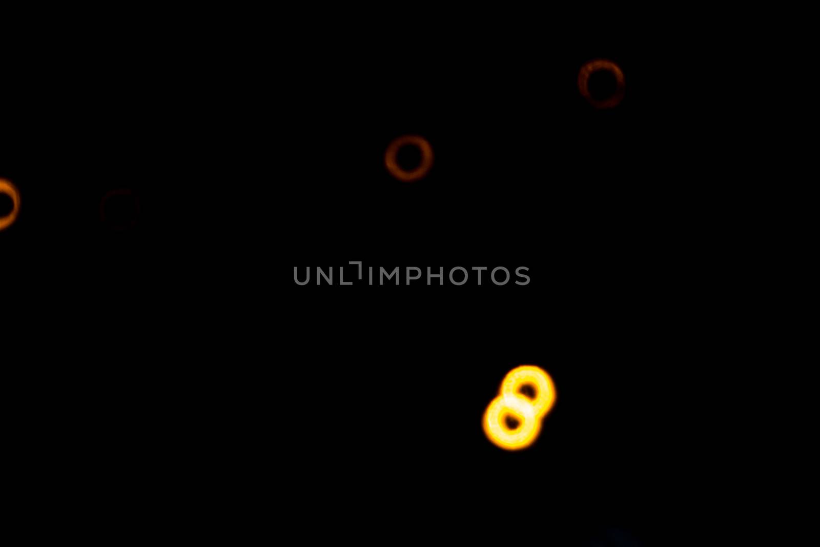 yellow lights on a black background abstraction night city