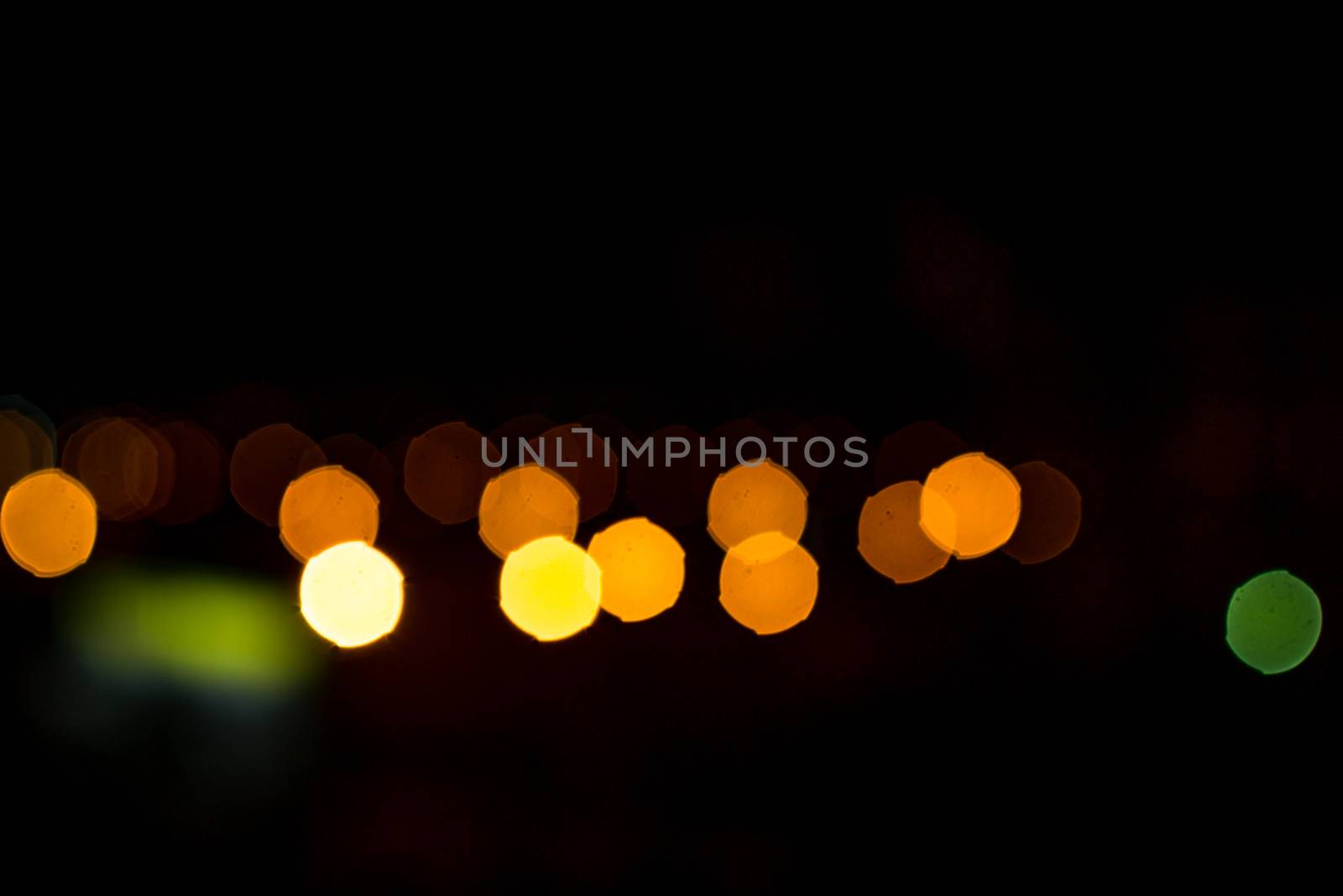 yellow lights on a black background abstraction night city