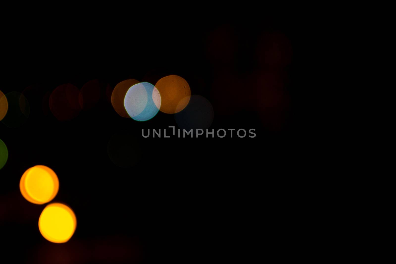 yellow lights on a black background abstraction night city